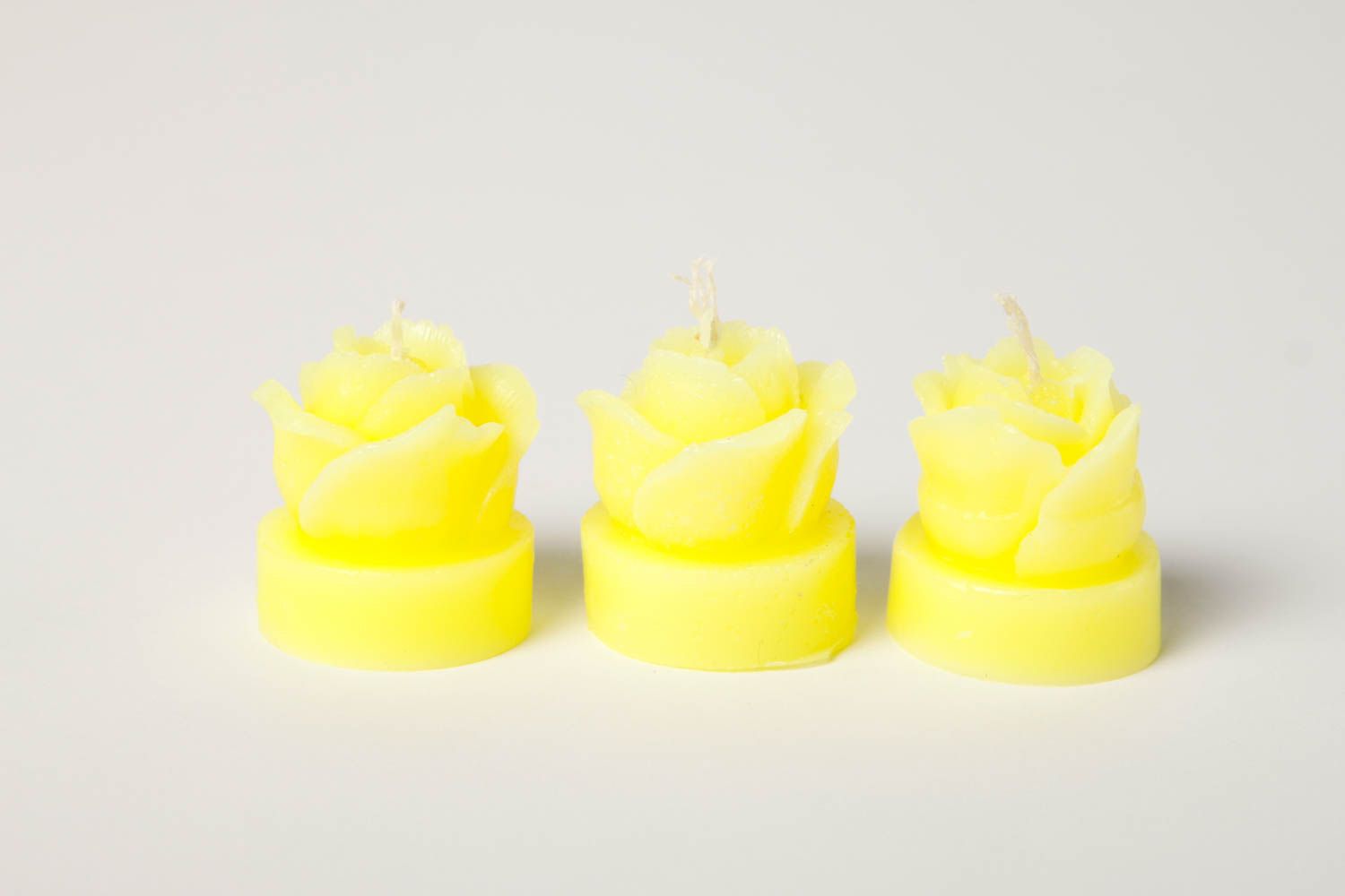 Handmade beautiful candles bright yellow candles 3 cute decor elements photo 3