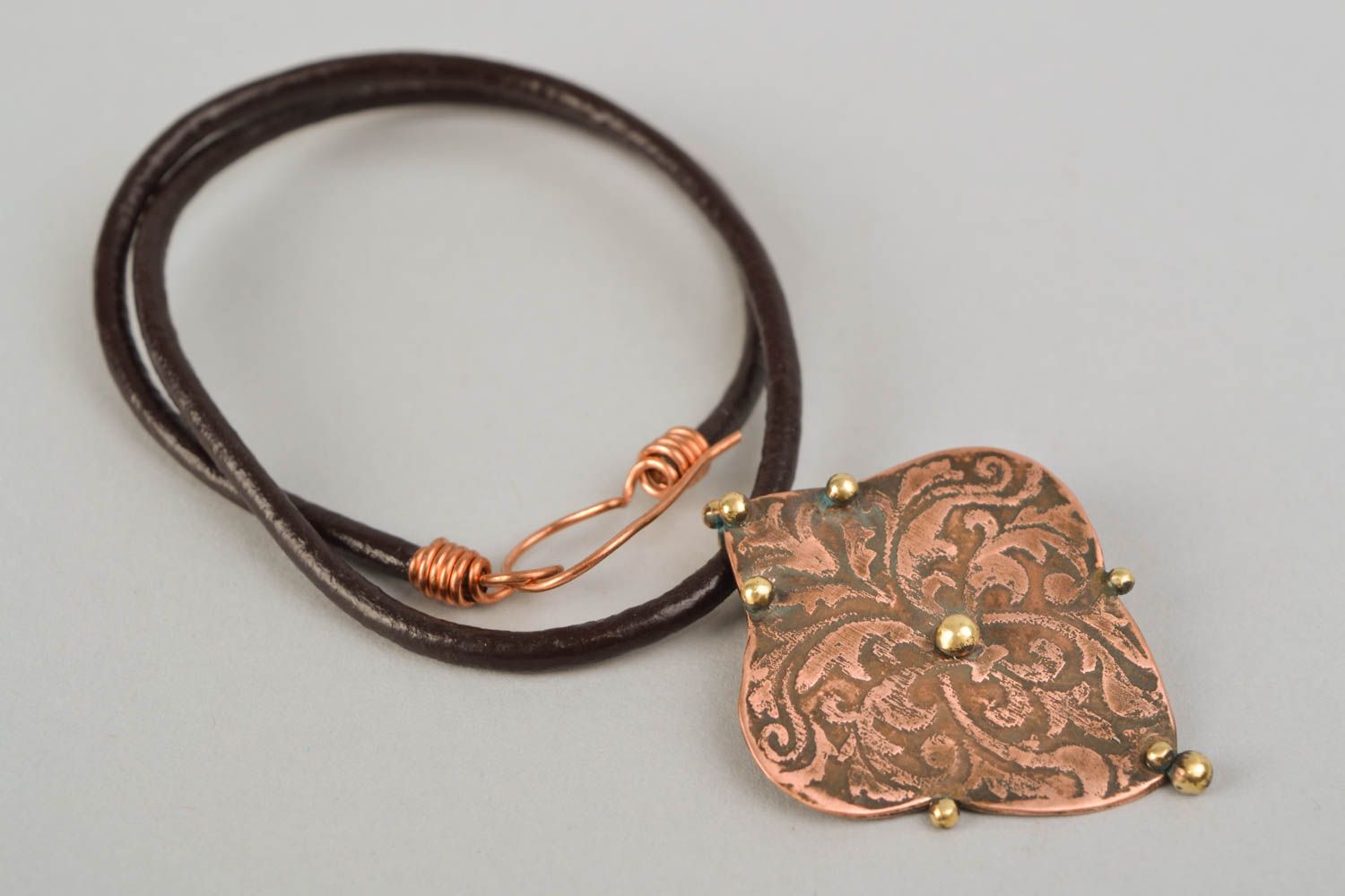 Latten and copper pendant on cord photo 4