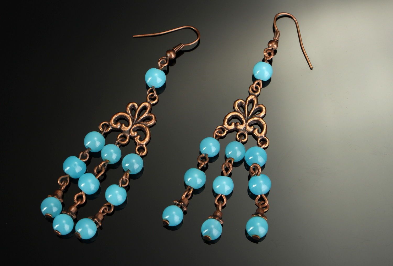 Long hanging earrings made of copper and glass photo 1