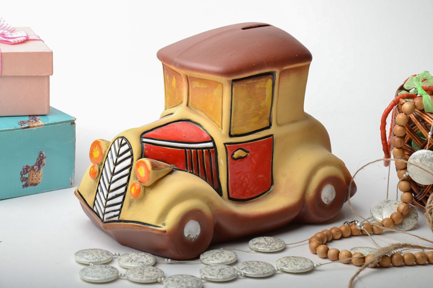 Clay money box in the shape of car photo 1