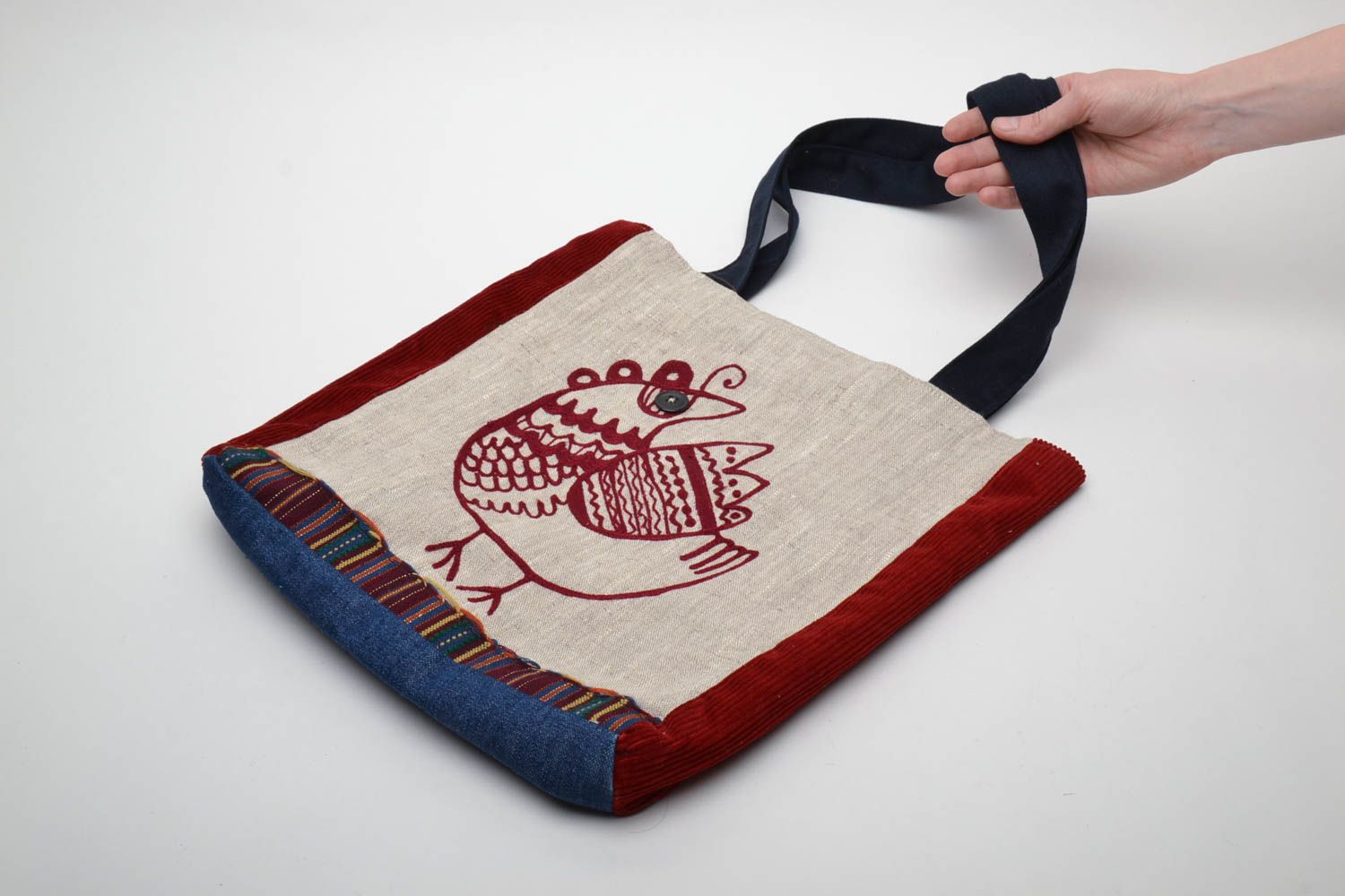 Handmade fabric bag with embroidered bird photo 1