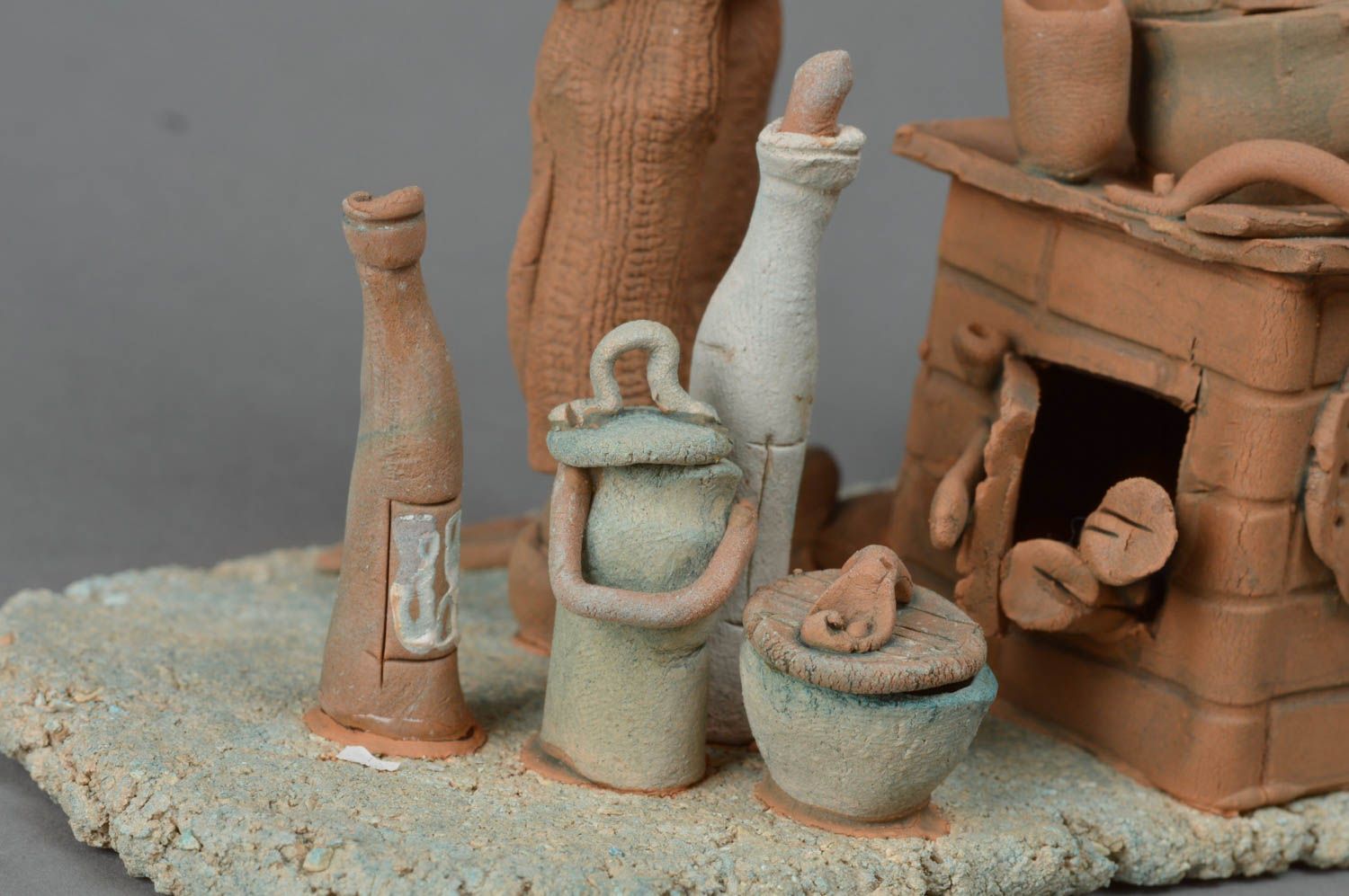 Handmade designer ceramic miniature sculpture Brewing white and red clay figurine photo 3