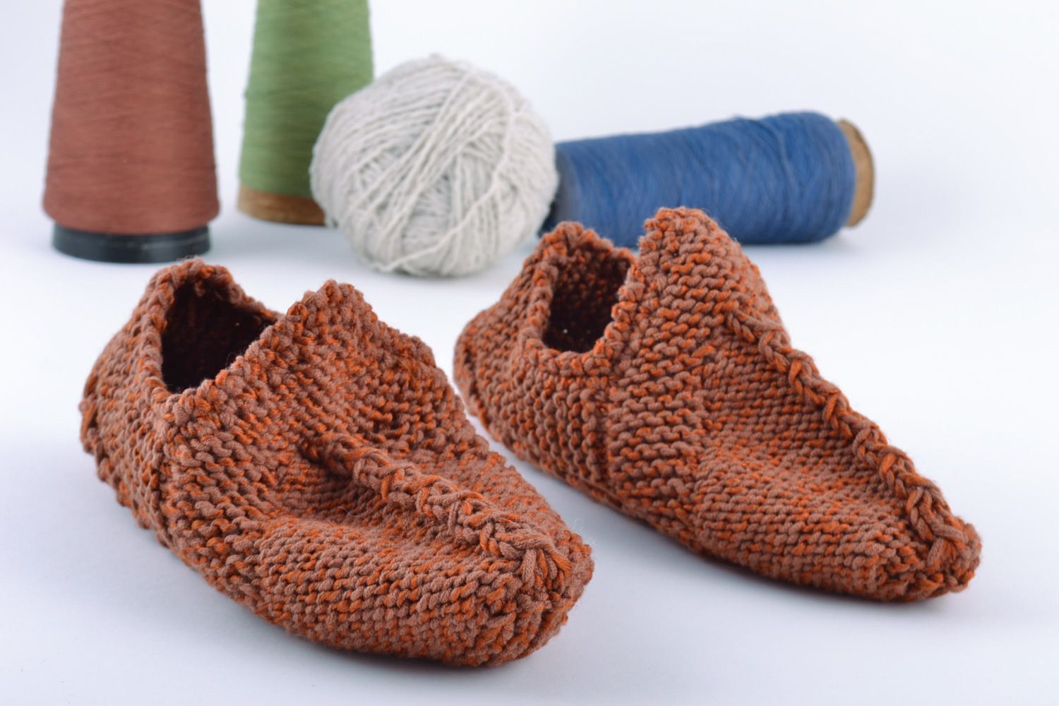 Beautiful warm handmade knitted half-woolen slippers of brown color photo 1