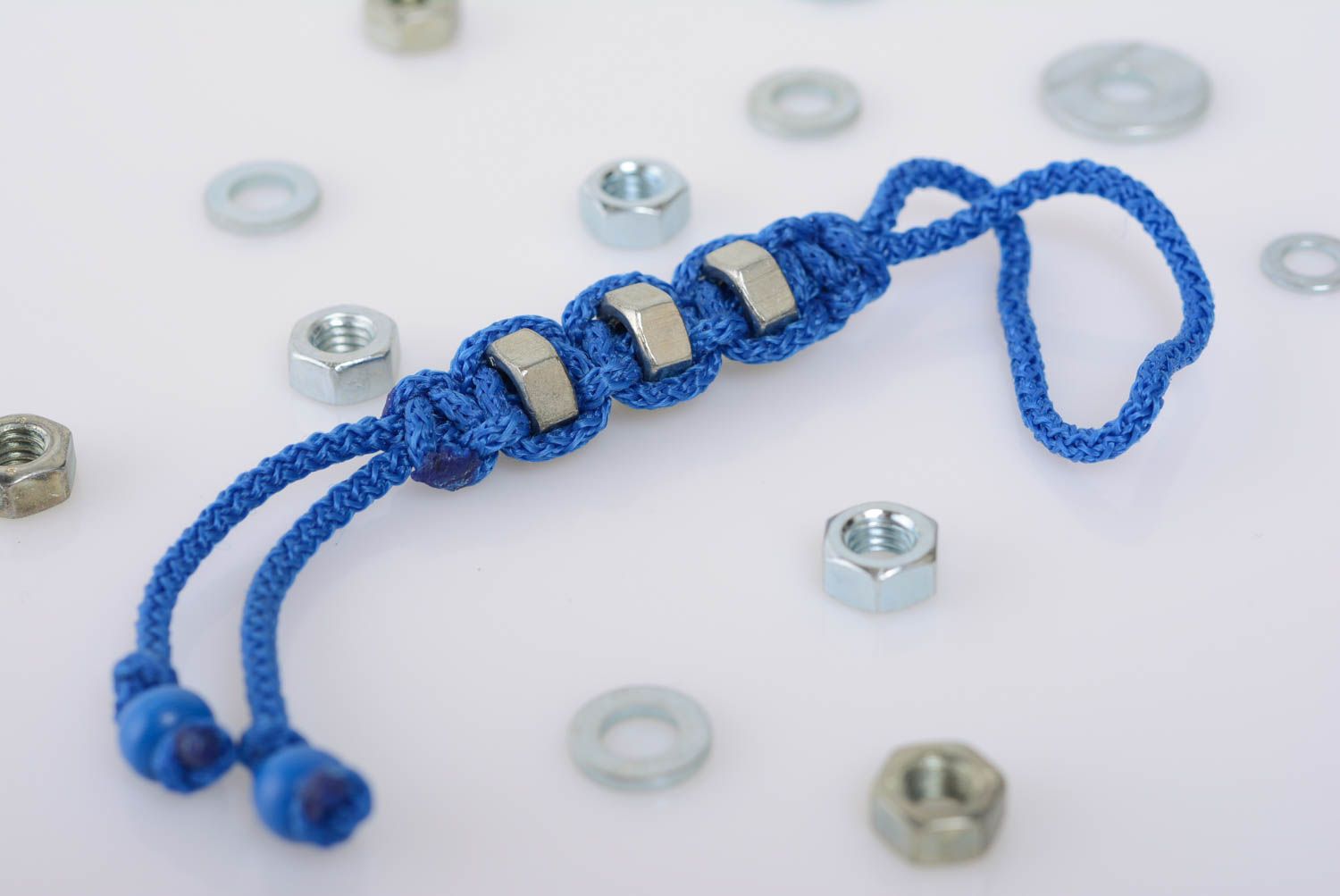 Beautiful blue handmade macrame woven keychain with metal nuts photo 1