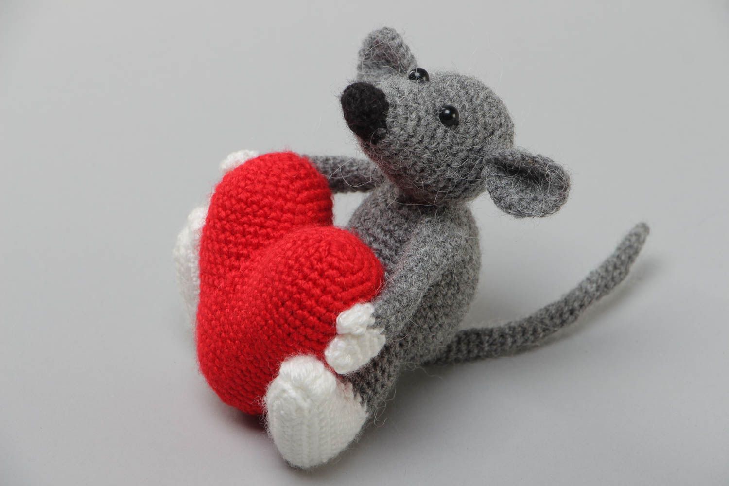 Handmade soft toy crocheted of acrylic threads small gray mouse with red heart photo 2