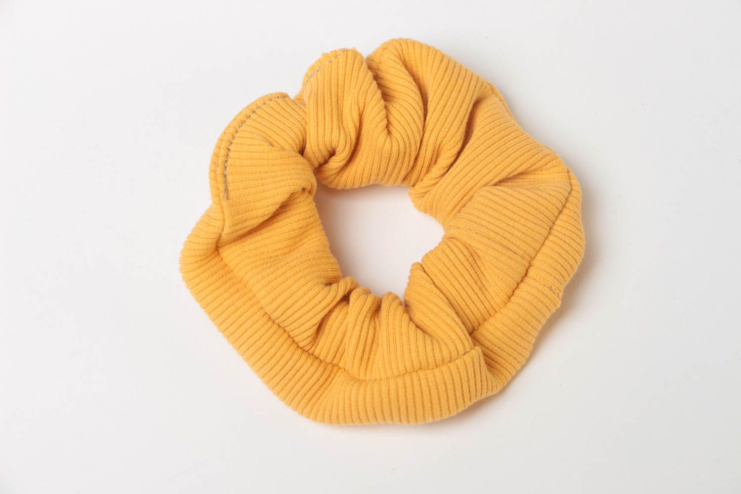 Handmade decorative stretch fabric hair tie of yellow color of laconic design photo 2