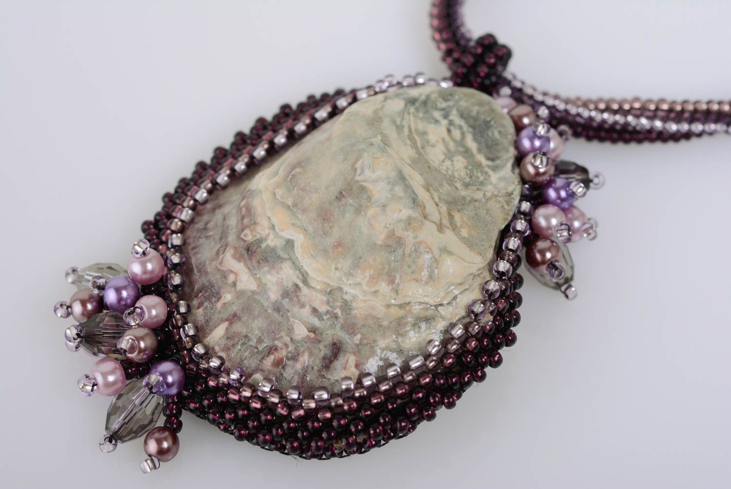 Handmade designer beaded pendant with natural seashell in violet color palette photo 2