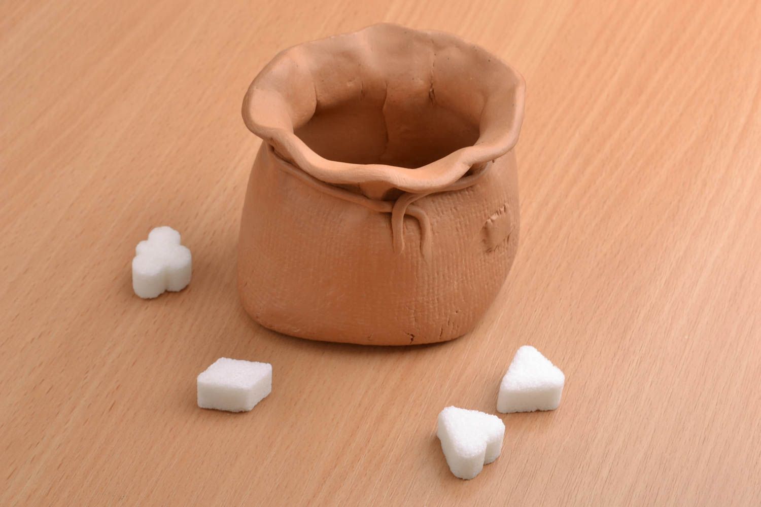 Ceramic dry goods pot in the shape of bag photo 1