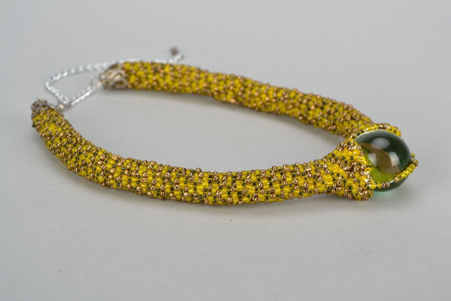 Beaded cord necklace with a glass bead photo 2