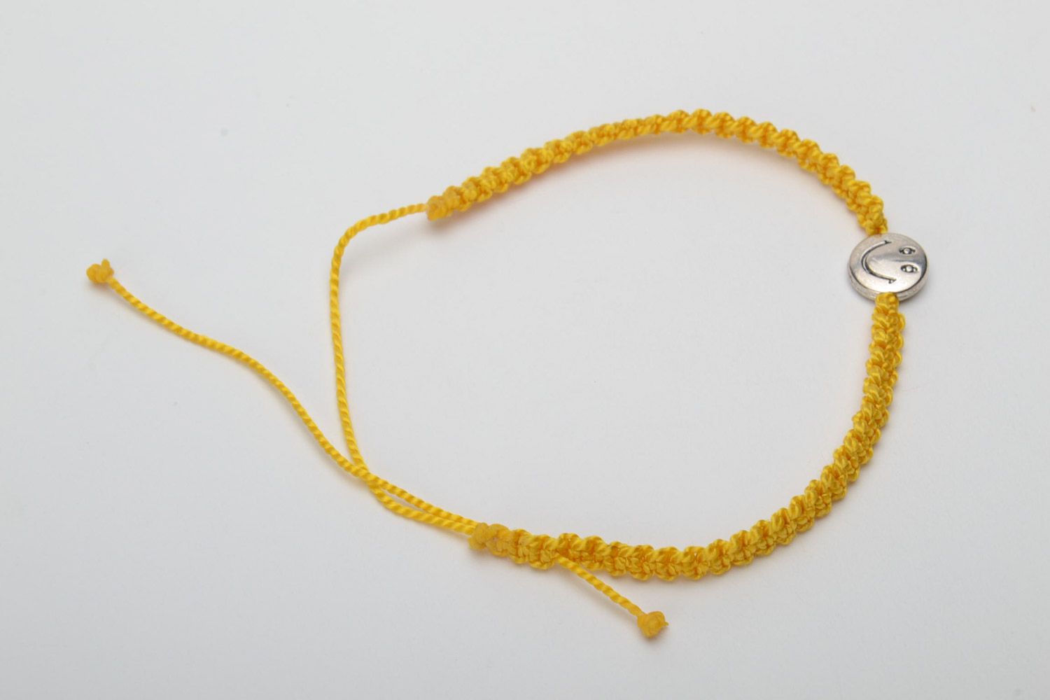Handmade macrame woven women's wrist bracelet with metal charm smilie photo 4