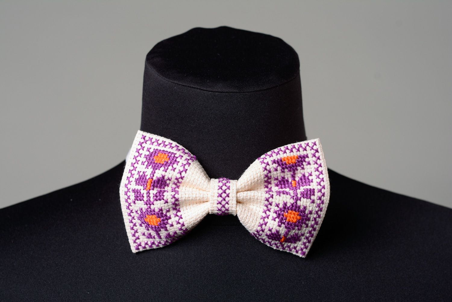 Handmade white bow tie with bright ethnic cross stitch embroidery for men photo 1