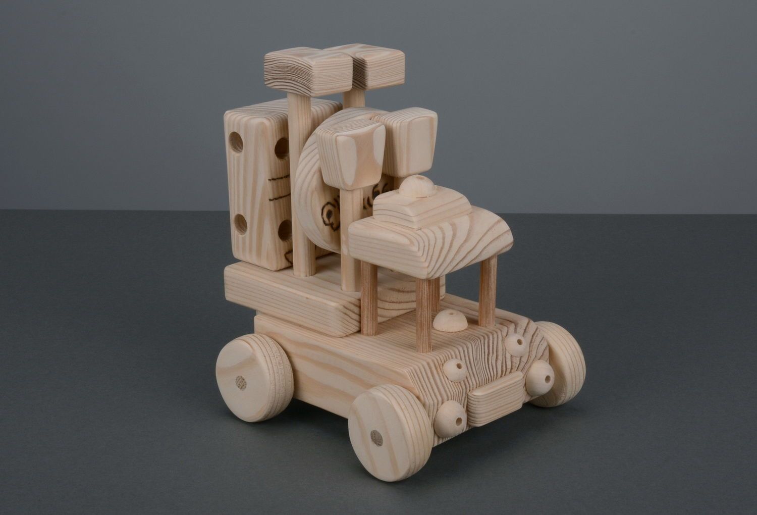 wooden car with a man photo 1