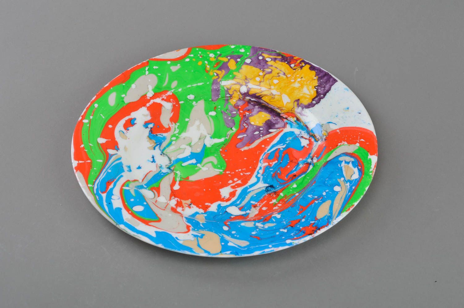 Handmade designer bright round glass plate decorated using marbelling technique photo 1
