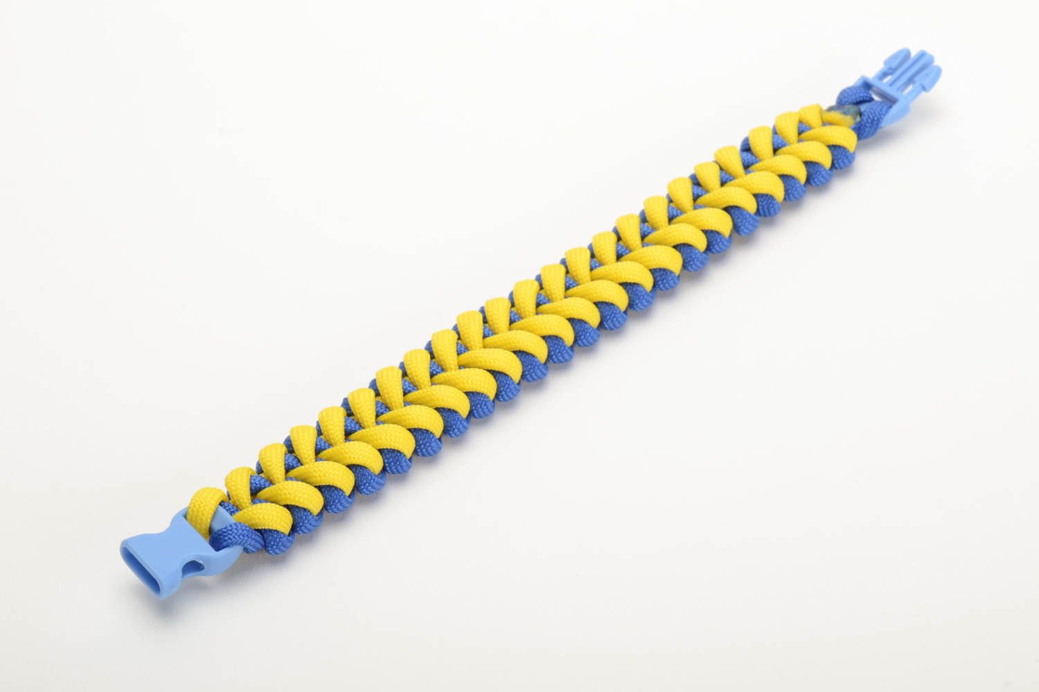 Handmade braided bracelet made of parachute cord blue and yellow unisex accessory photo 4