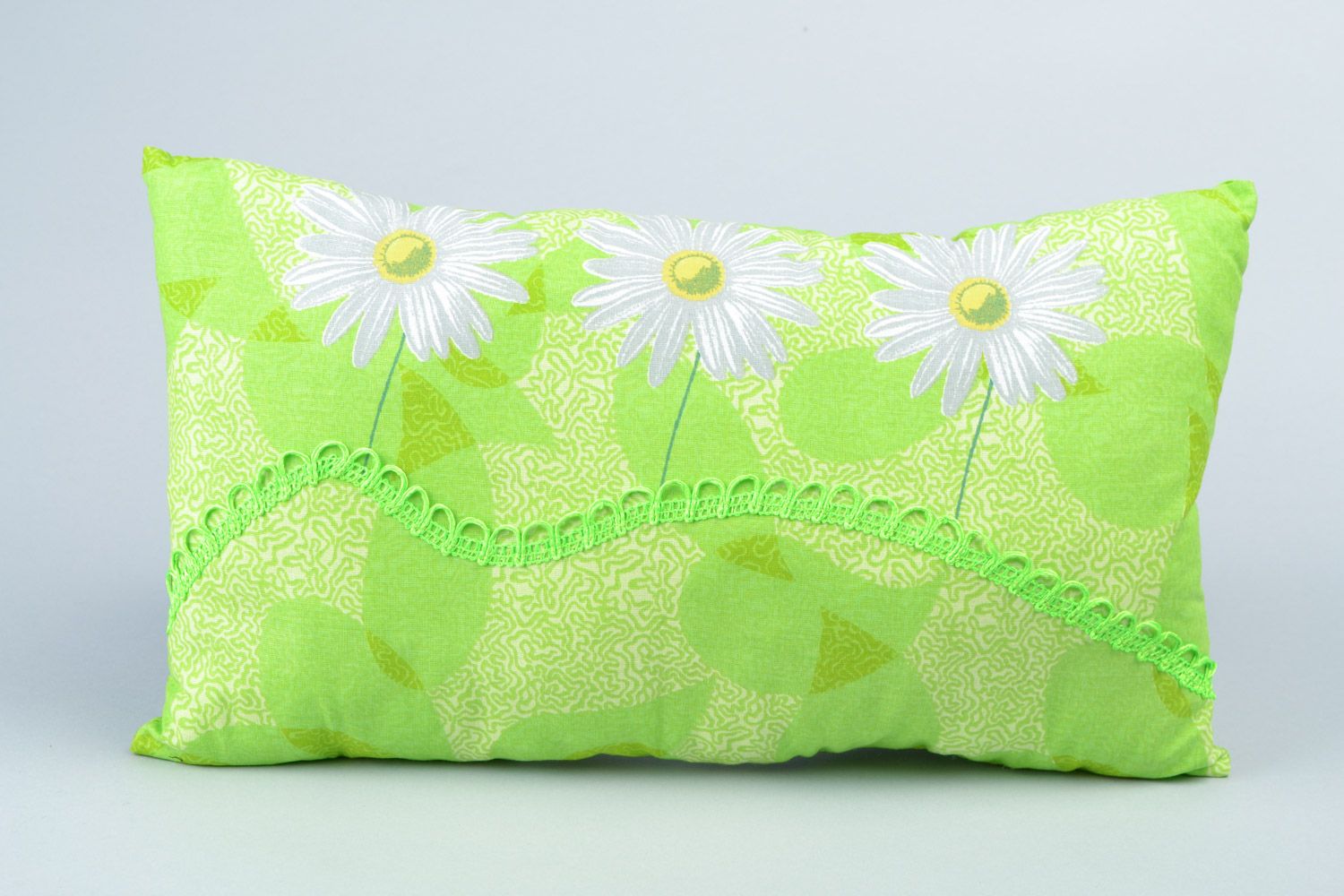 Handmade rectangular accent pillow of tender green color with chamomiles photo 1