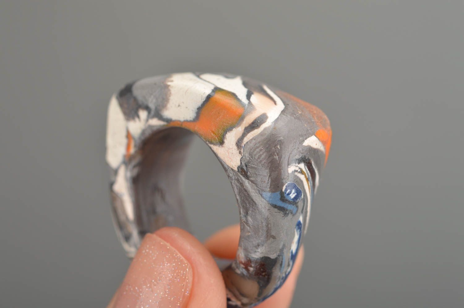 Handmade ring of polymer clay in grey color with splashes of other colors photo 2