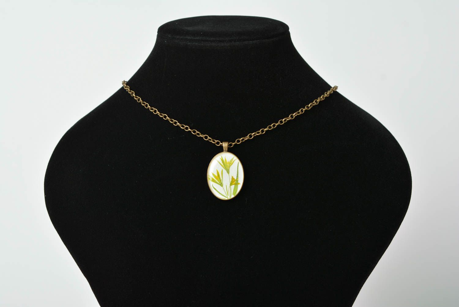 Handmade designer oval white pendant with dried flowers in epoxy resin on chain photo 2