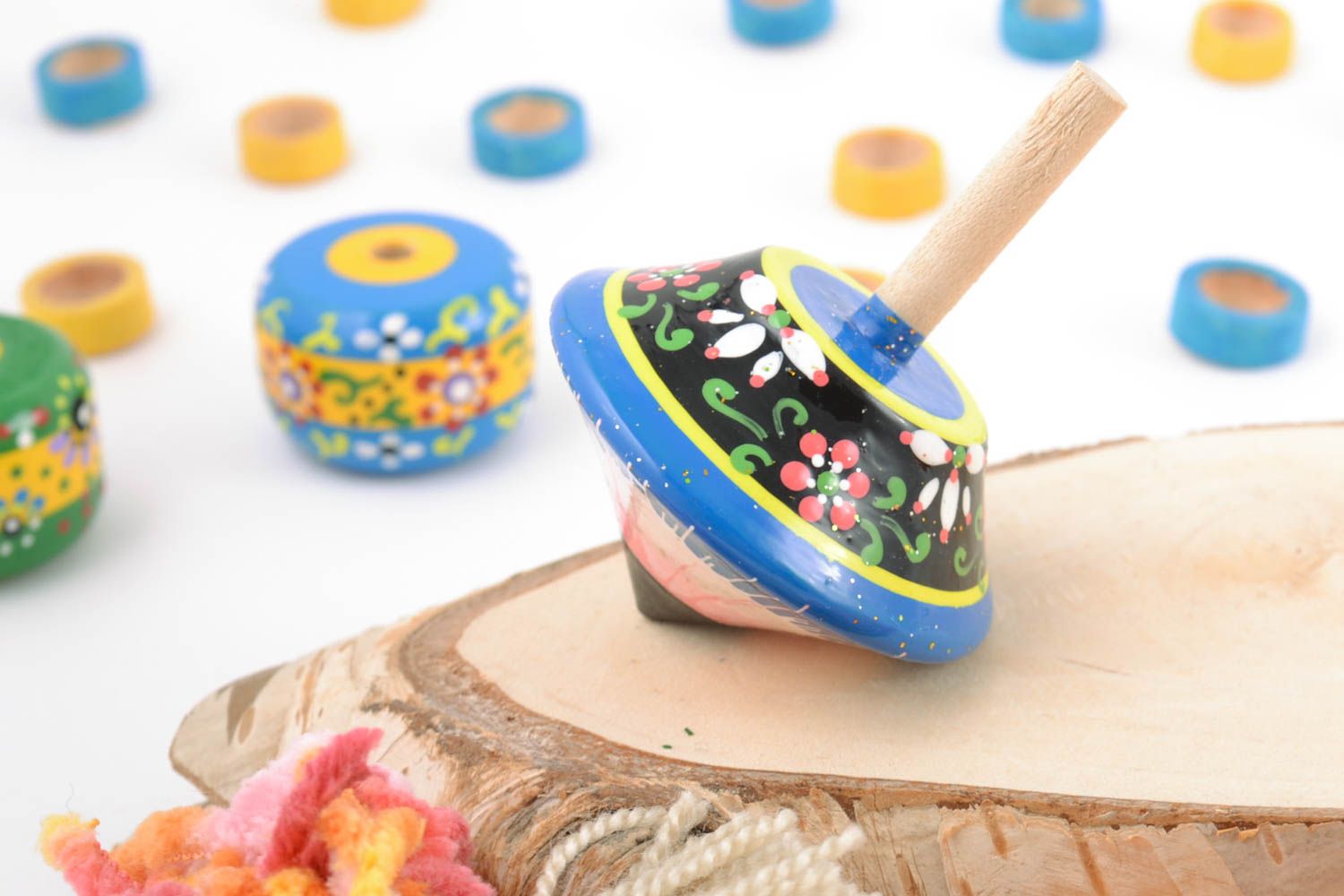 Eco friendly beautiful handmade painted wooden toy spinning top photo 1