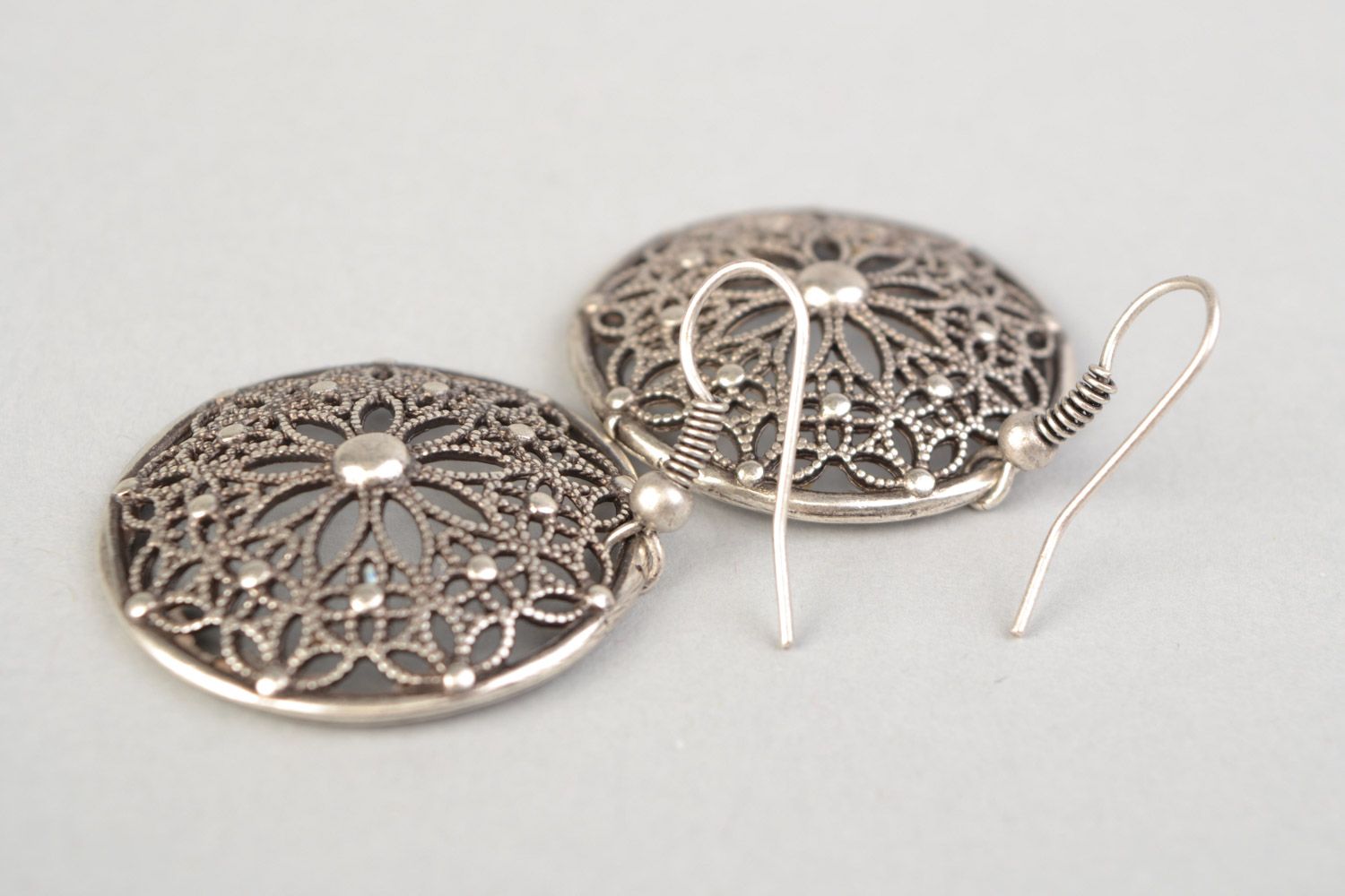 Handmade round lacy dangling earrings cast of metal alloy in ethnic style photo 3