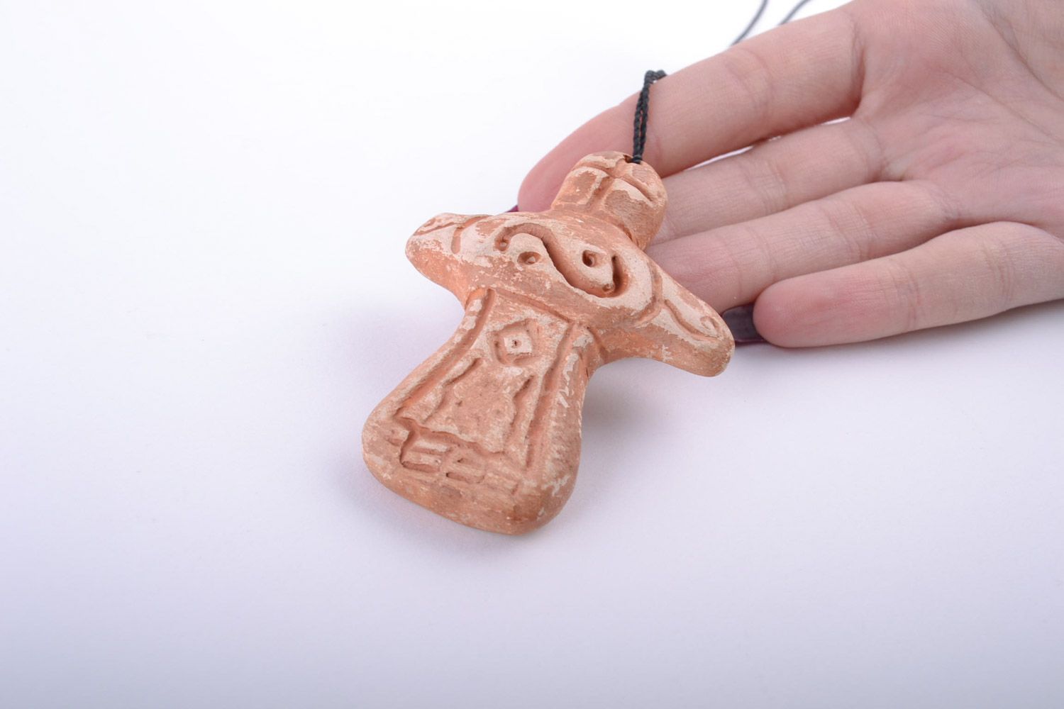 Handmade designer white clay cross pendant painted with engobes in ethnic style photo 2