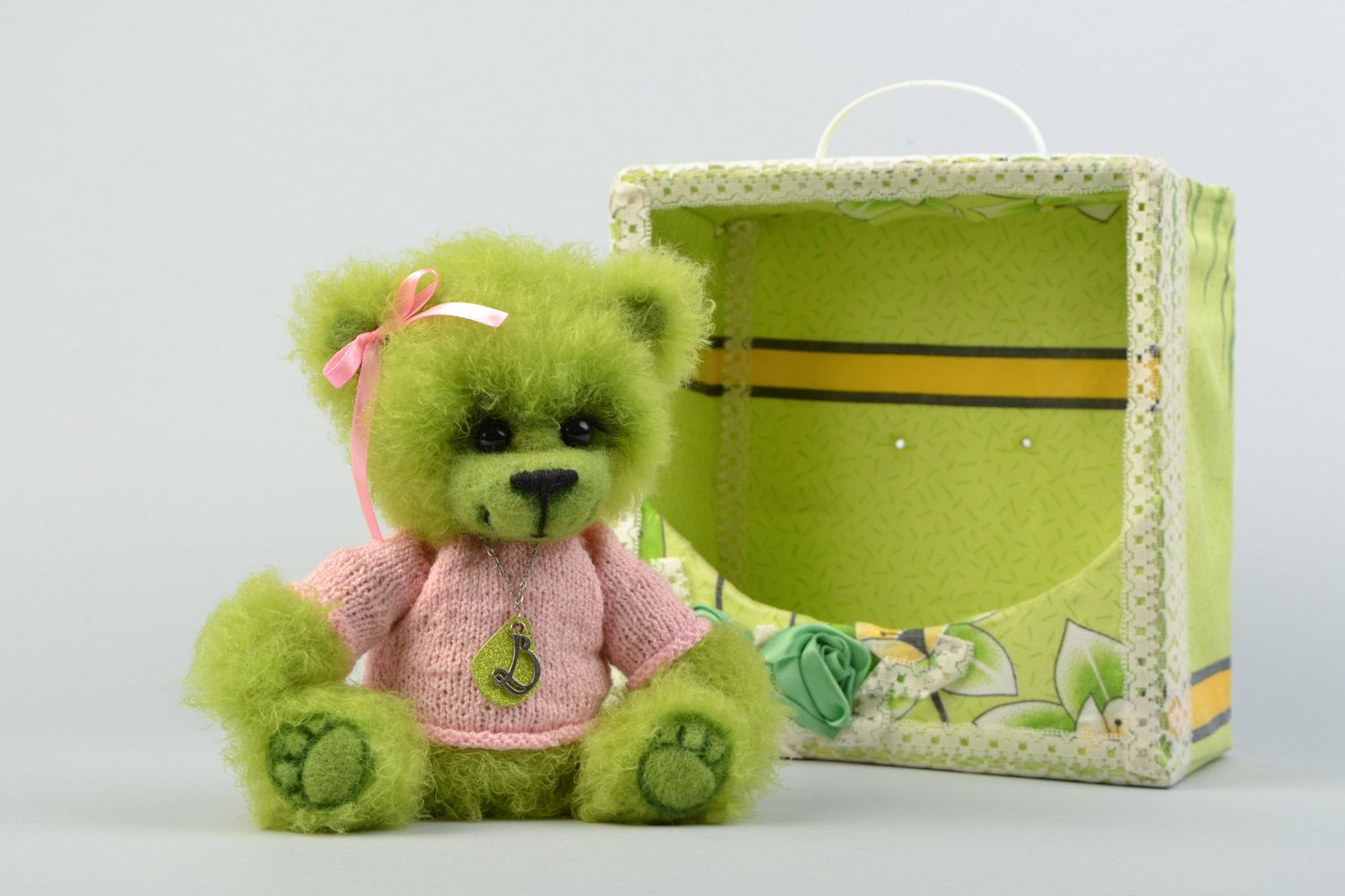 Handmade collectible crocheted soft toy bear in a box of light green color photo 1