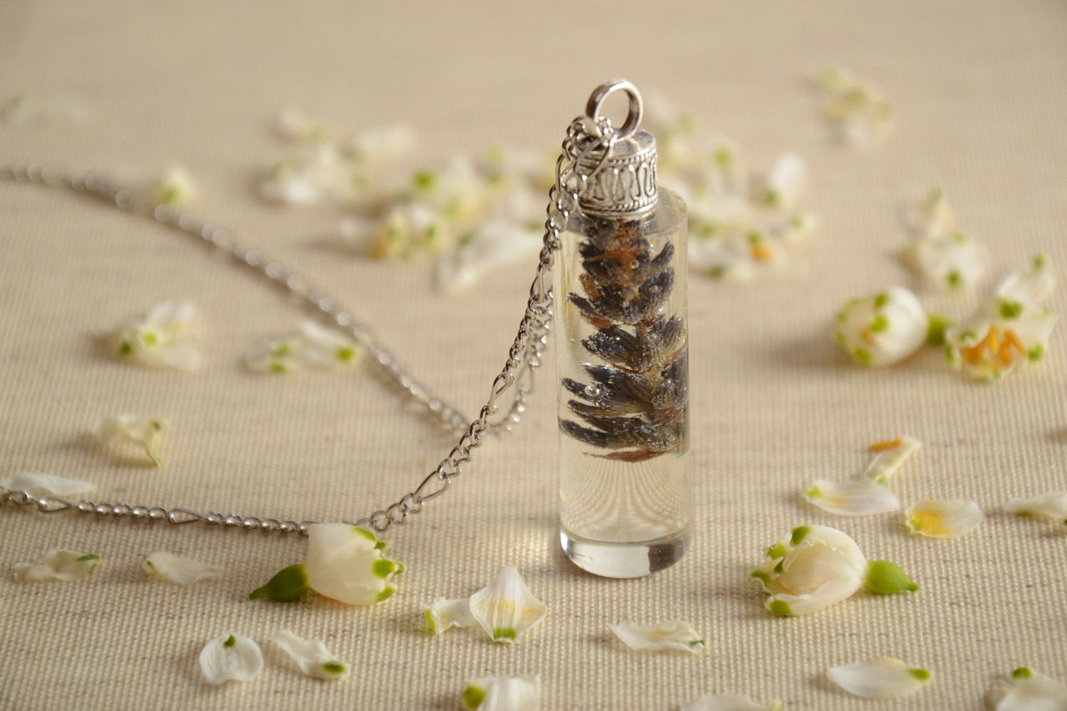 Handmade epoxy resin pendant with flowers in the shape of vial on chain photo 1