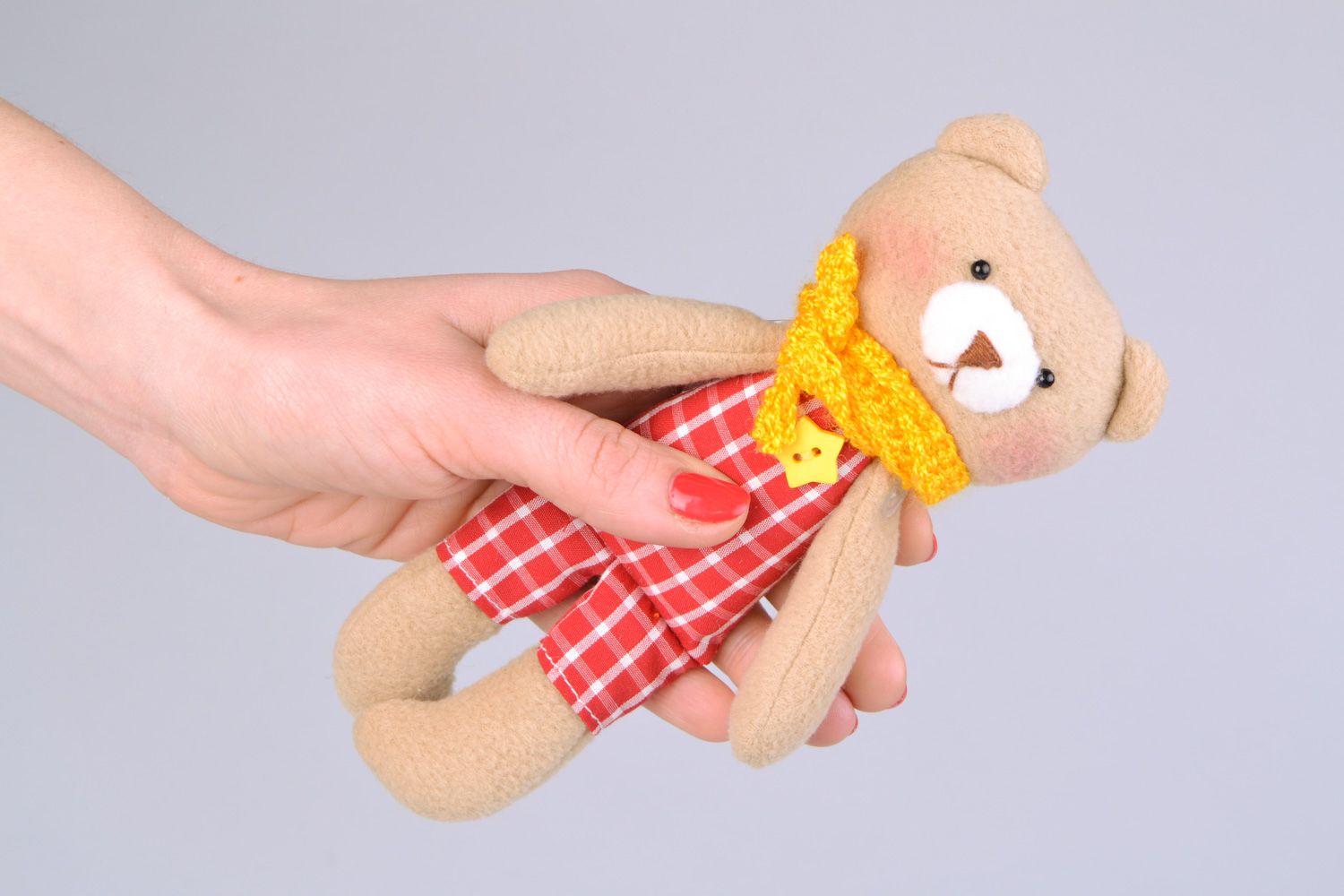 Handmade designer soft toy sewn of fleece Bear in checkered suit with yellow scarf photo 2