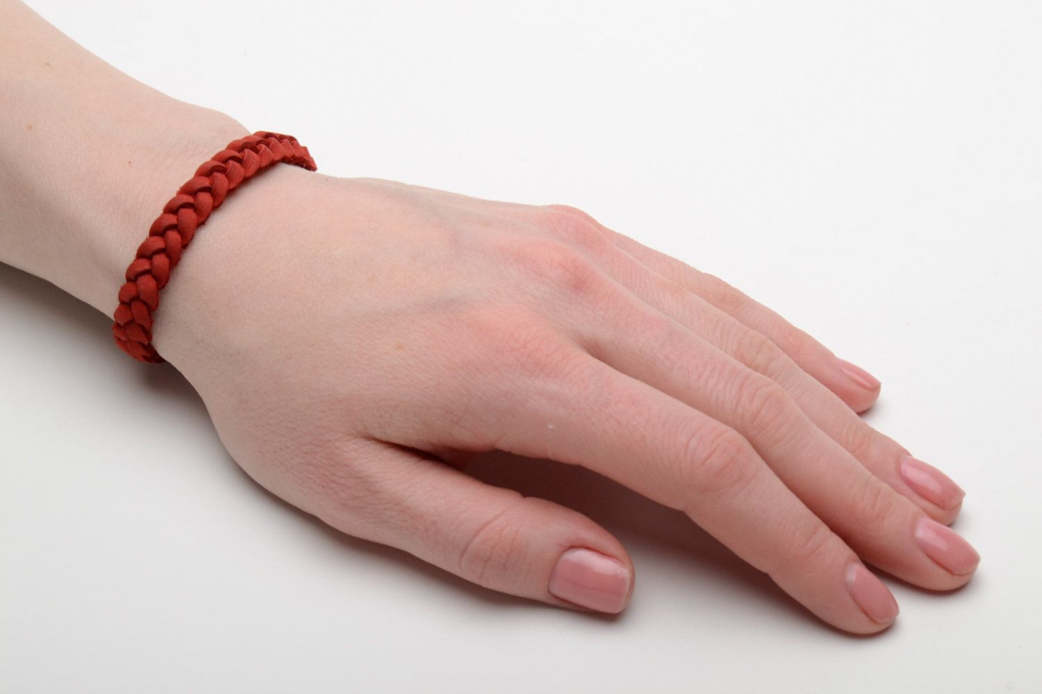 Thin handmade wrist bracelet woven of genuine leather of red color for women photo 2