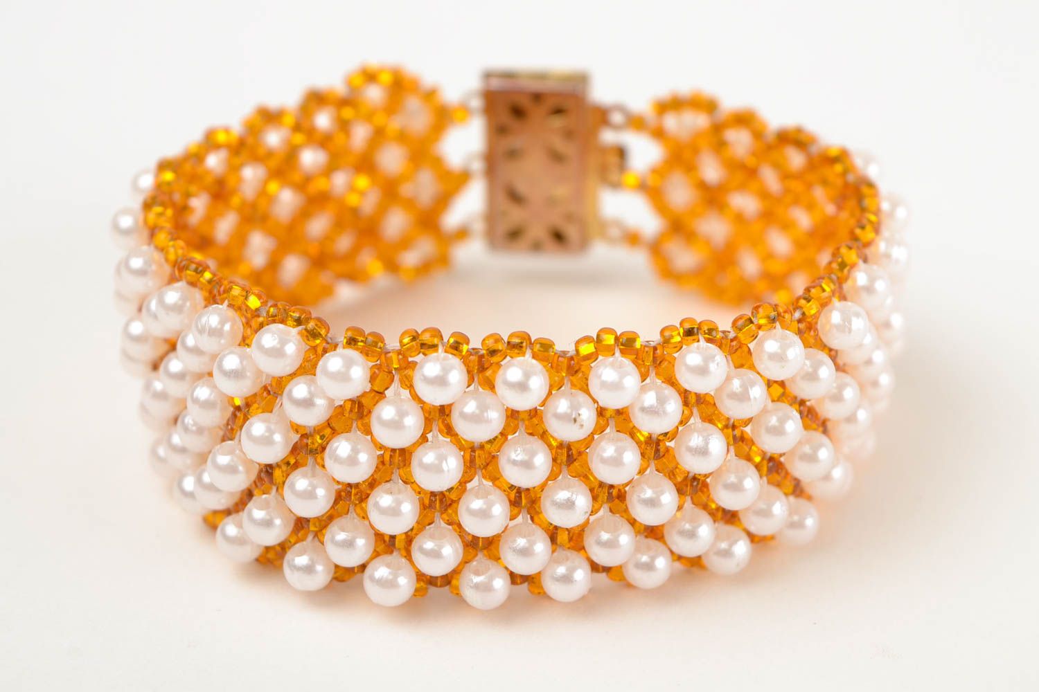 Handmade beaded wide bracelet in golden and white colors photo 4