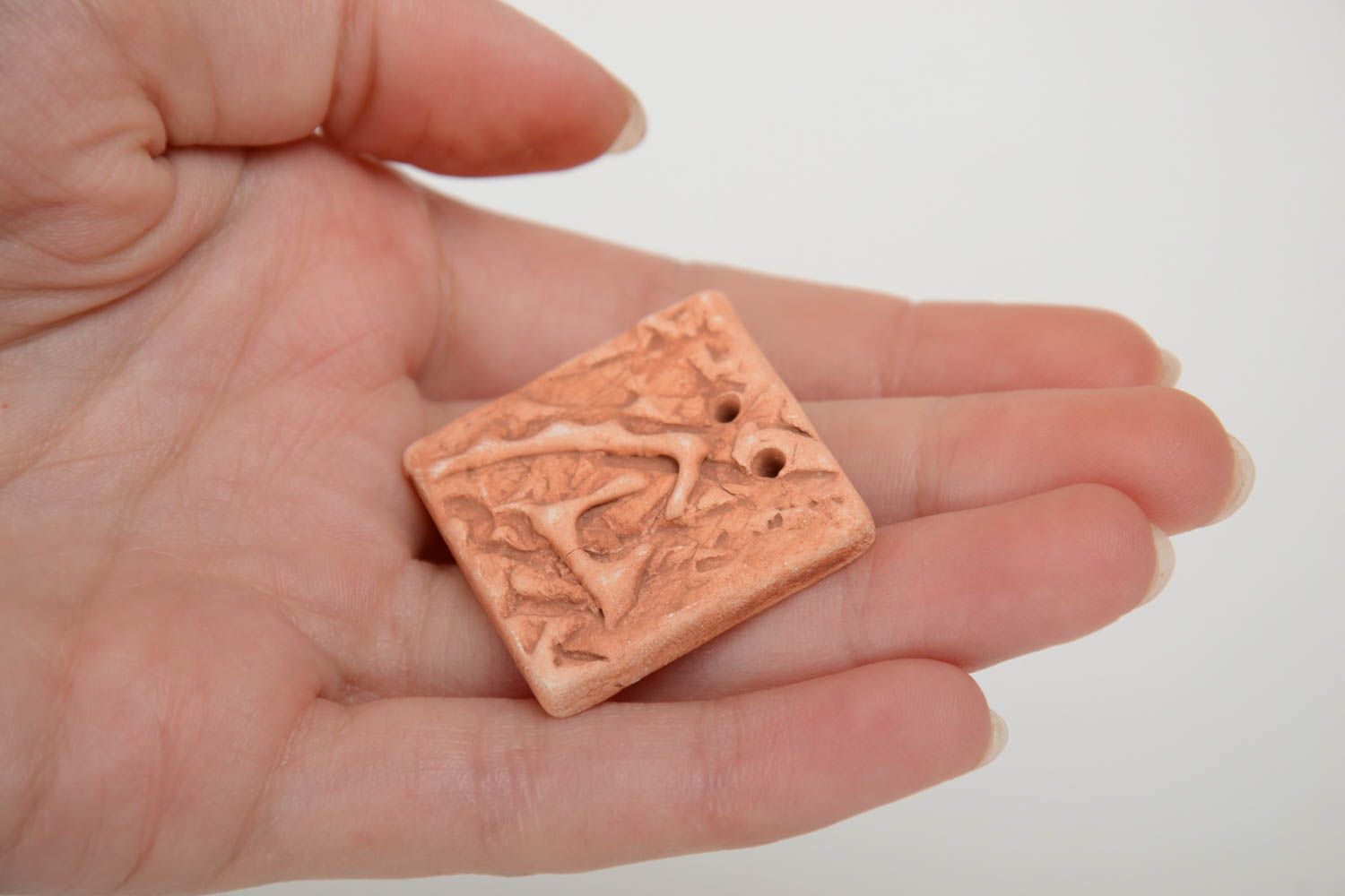 Homemade flat ceramic jewelry component with relief surface ethnic pendant  photo 4
