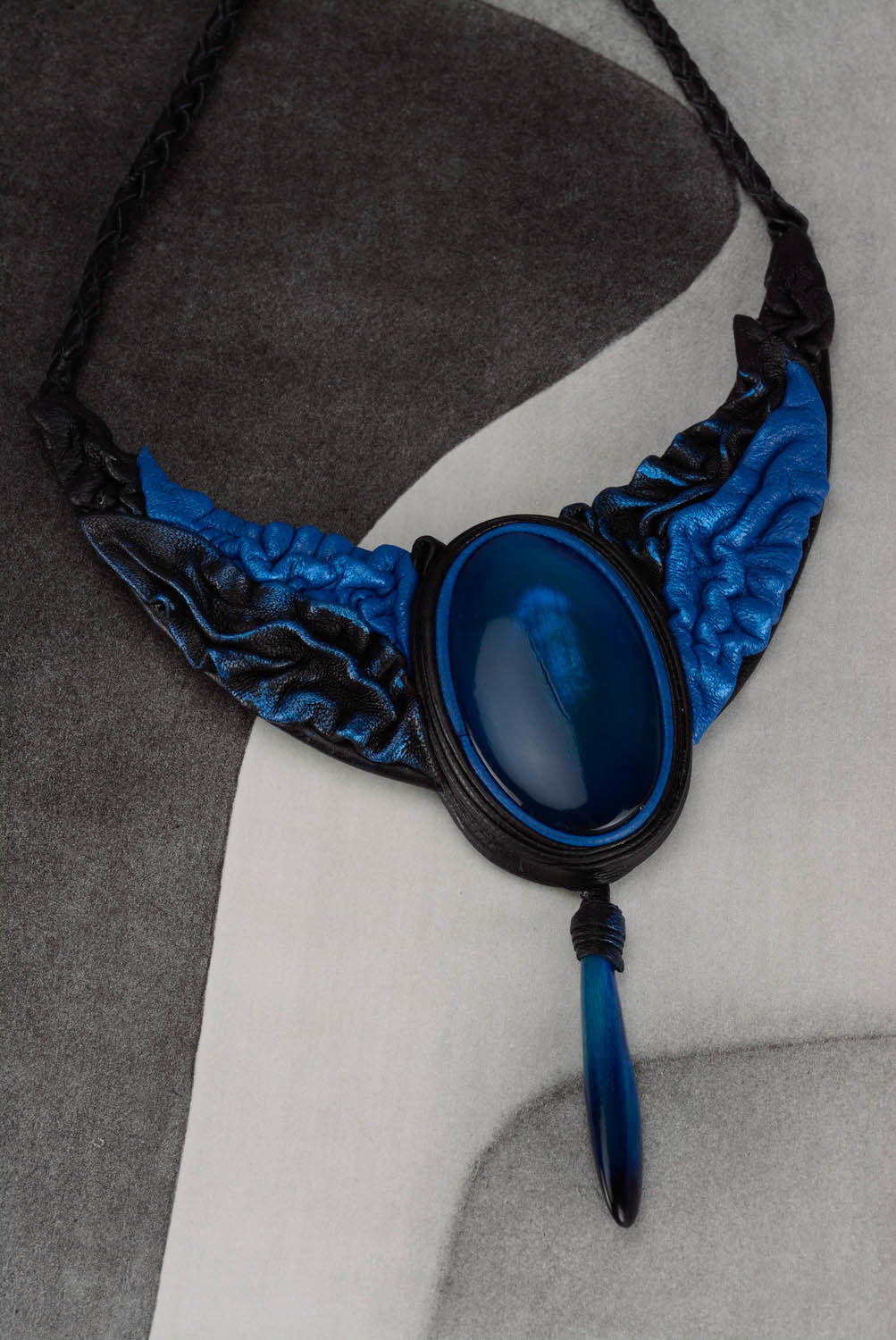 Necklace made of blue leather and horn photo 3