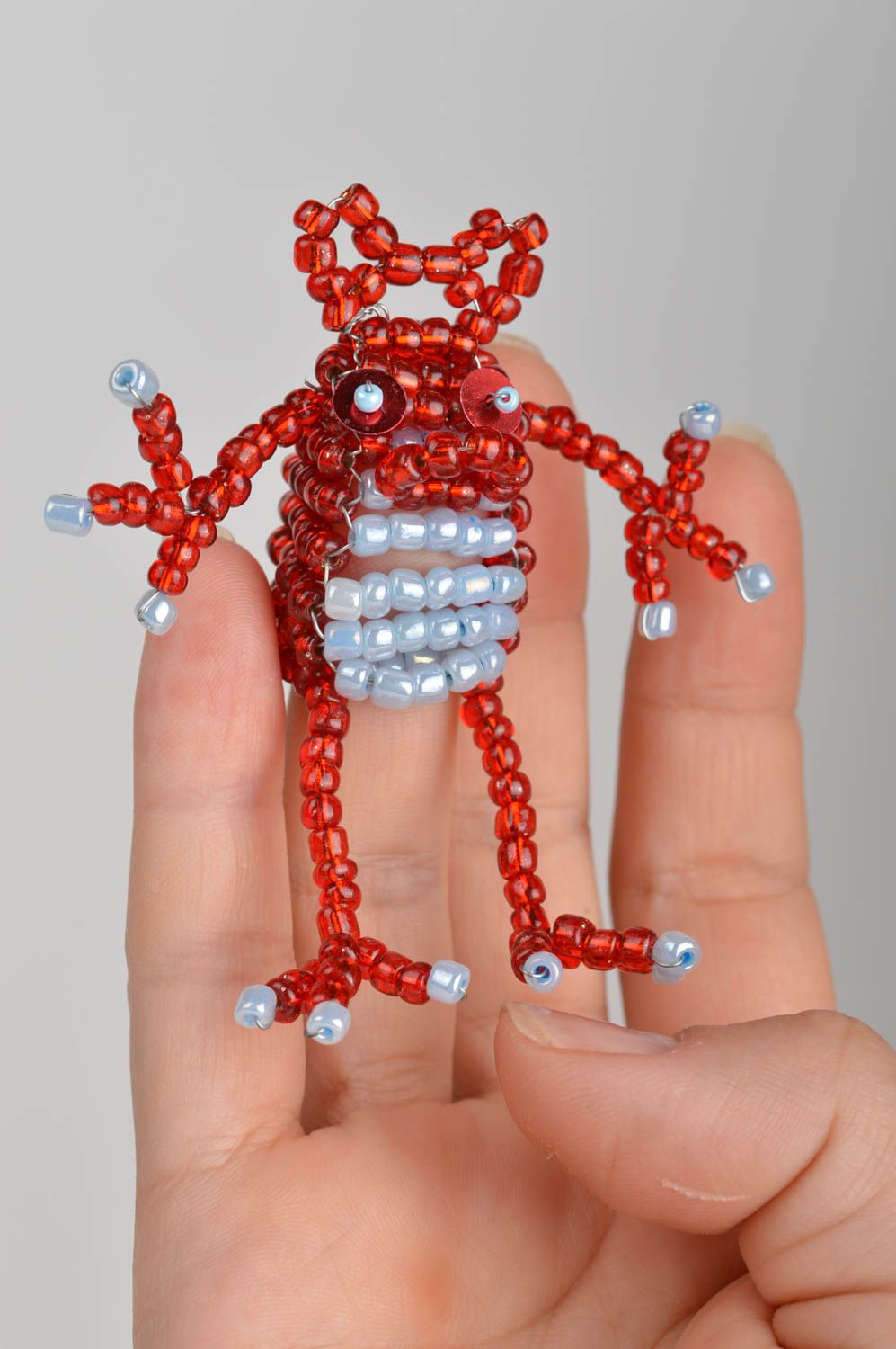 Пальчиковая игрушка лягушка красная забавная из китайского бисера ручной работы фото 1