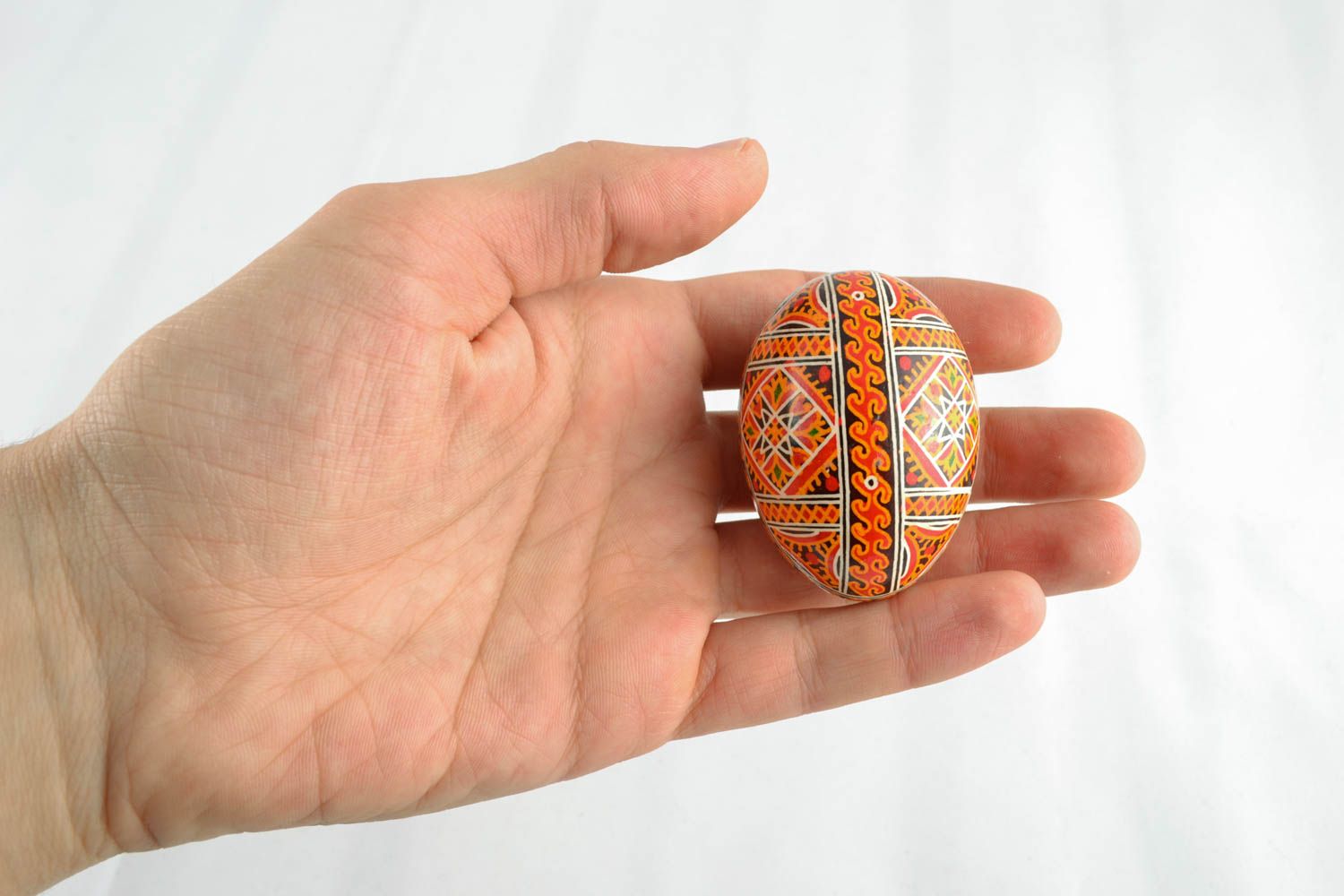 Handmade Easter egg with ornament photo 4