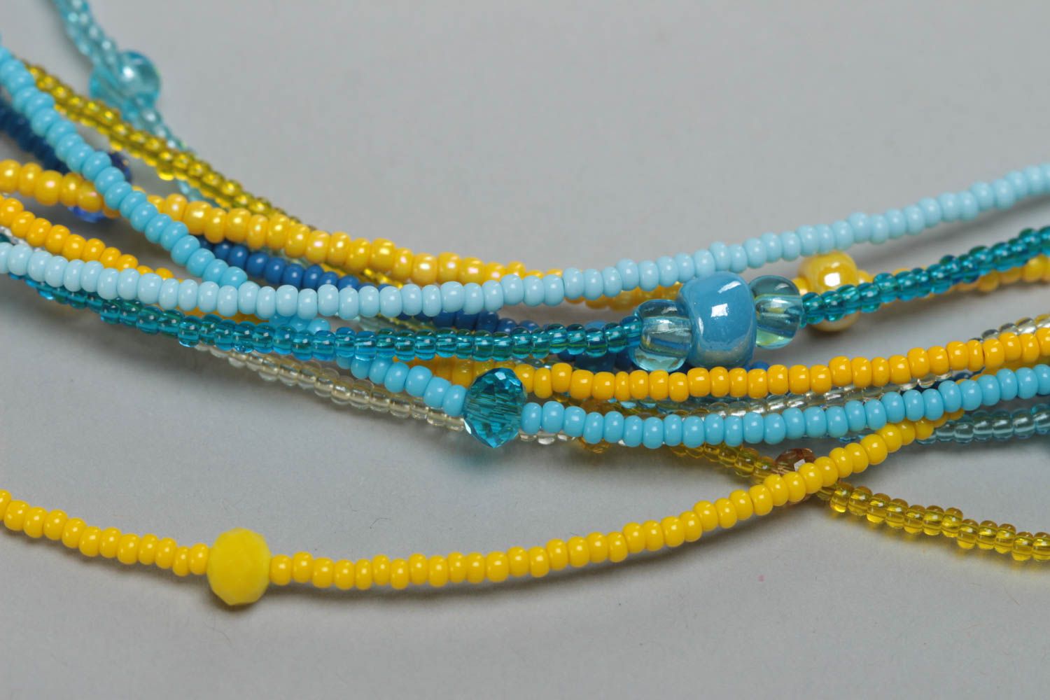 Yellow and blue bright handmade children's multirow beaded necklace photo 3