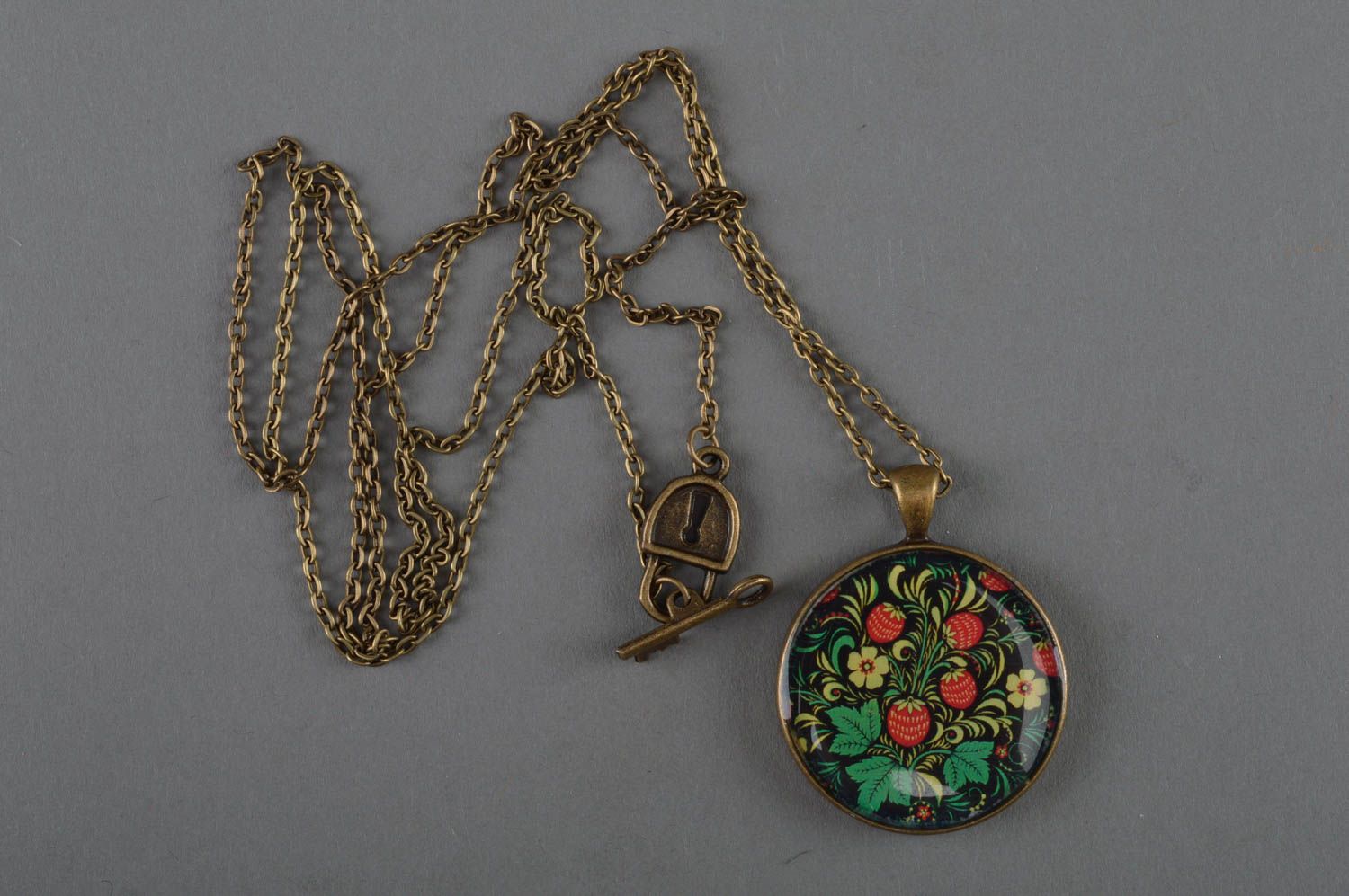 Beautiful handmade round epoxy resin pendant on long chain with decoupage berries image  photo 1