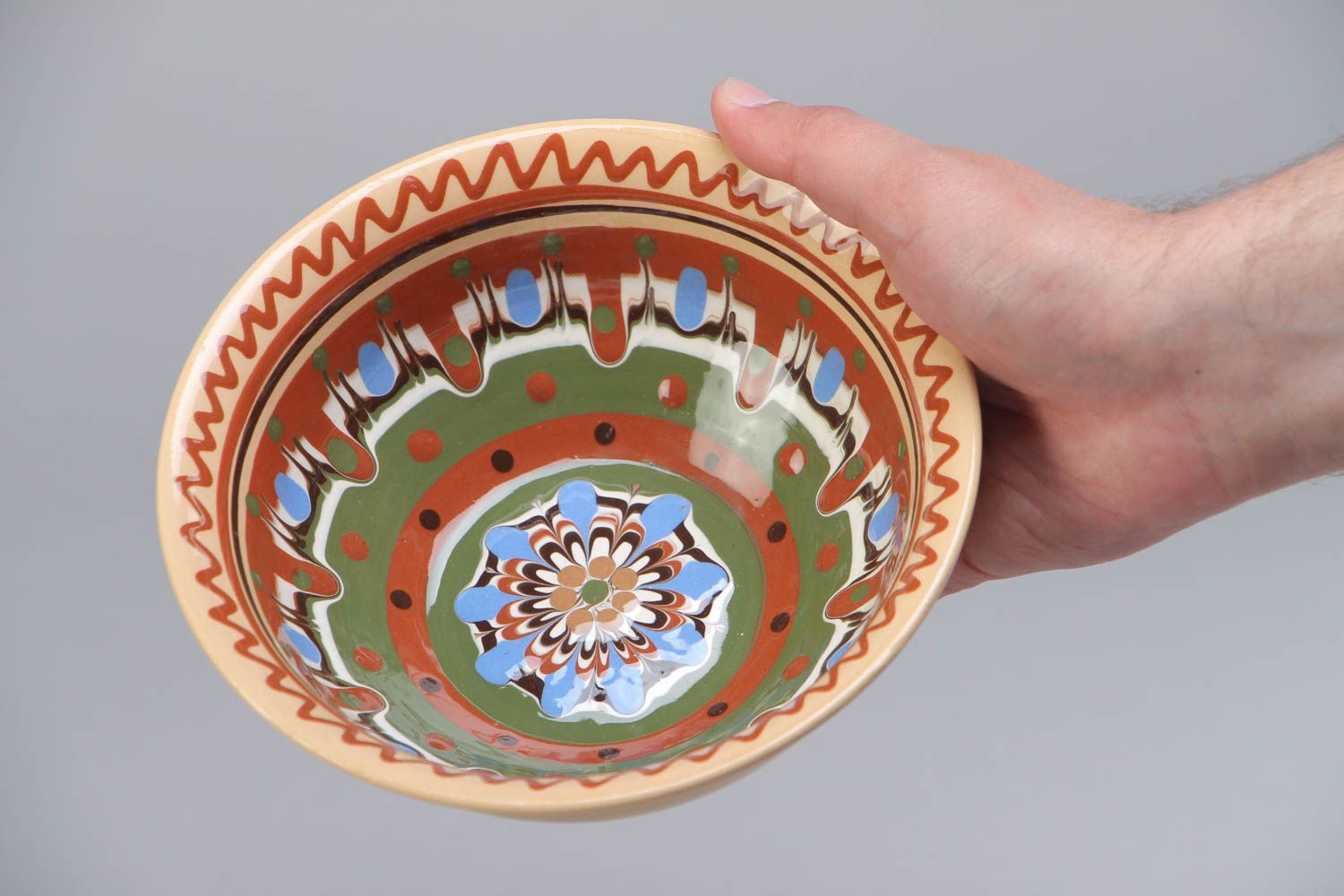 Handmade beautiful deep ceramic bowl ornamented with colorful glaze for 500 ml photo 5