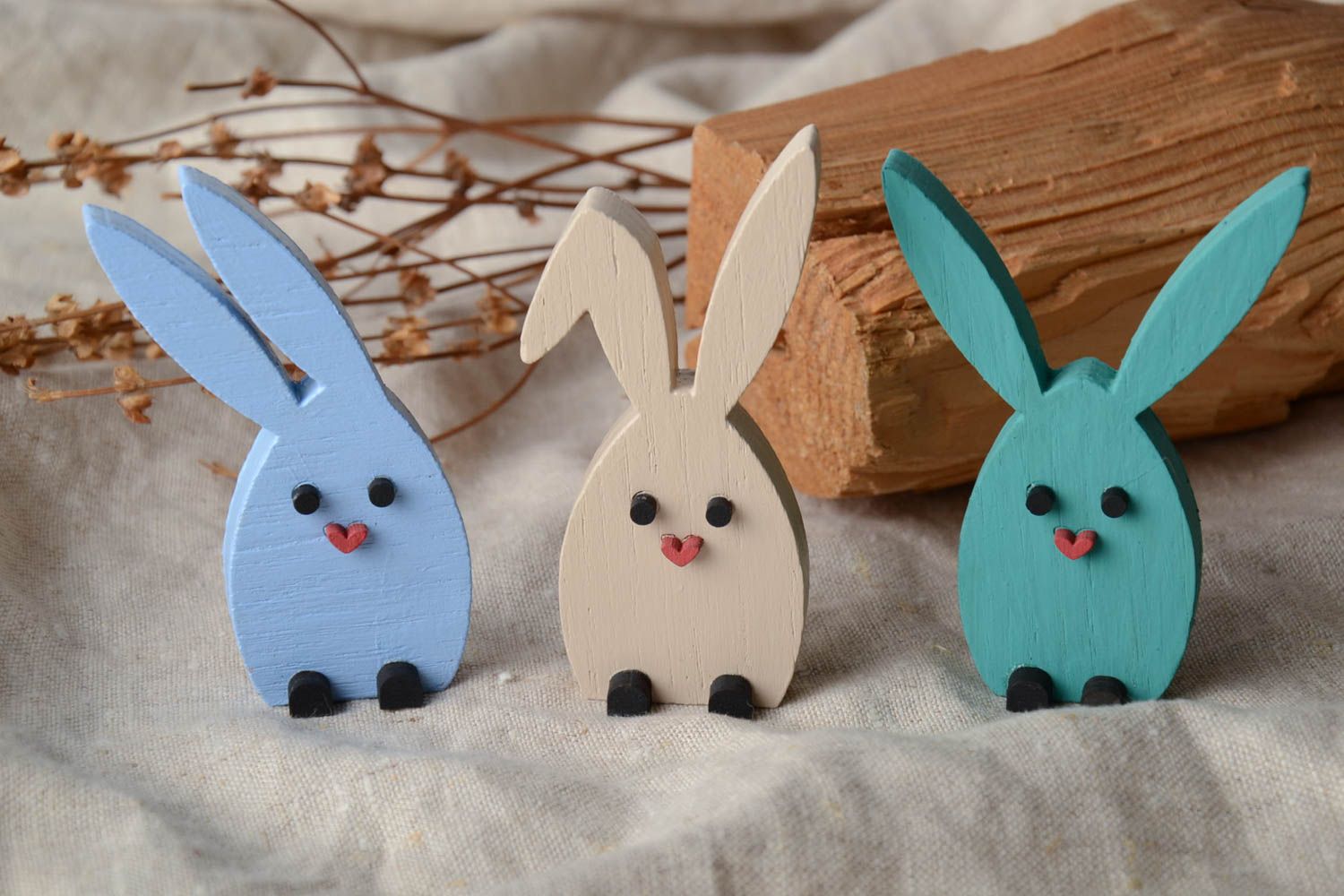 Plywood figurines in the shape of colorful rabbits 3 items photo 1
