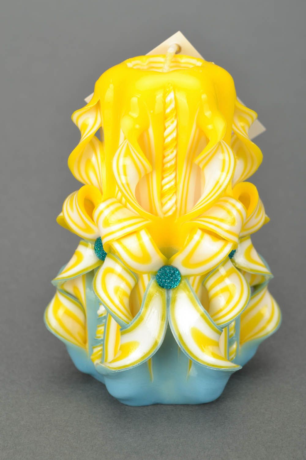 Yellow carved candle photo 4