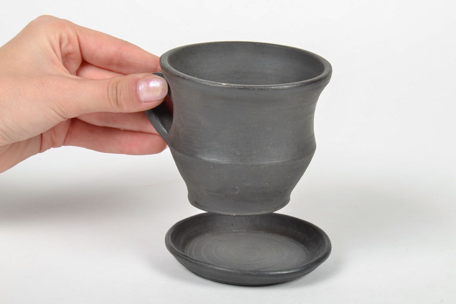 Tazza con piattino di argilla fatta a mano stoviglie in ceramica originali foto 5