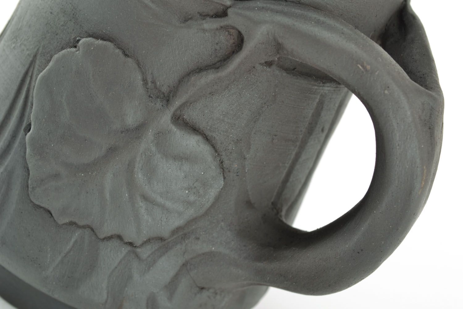 Black clay natural smoked cup with handle and autumn molded leaves pattern photo 2