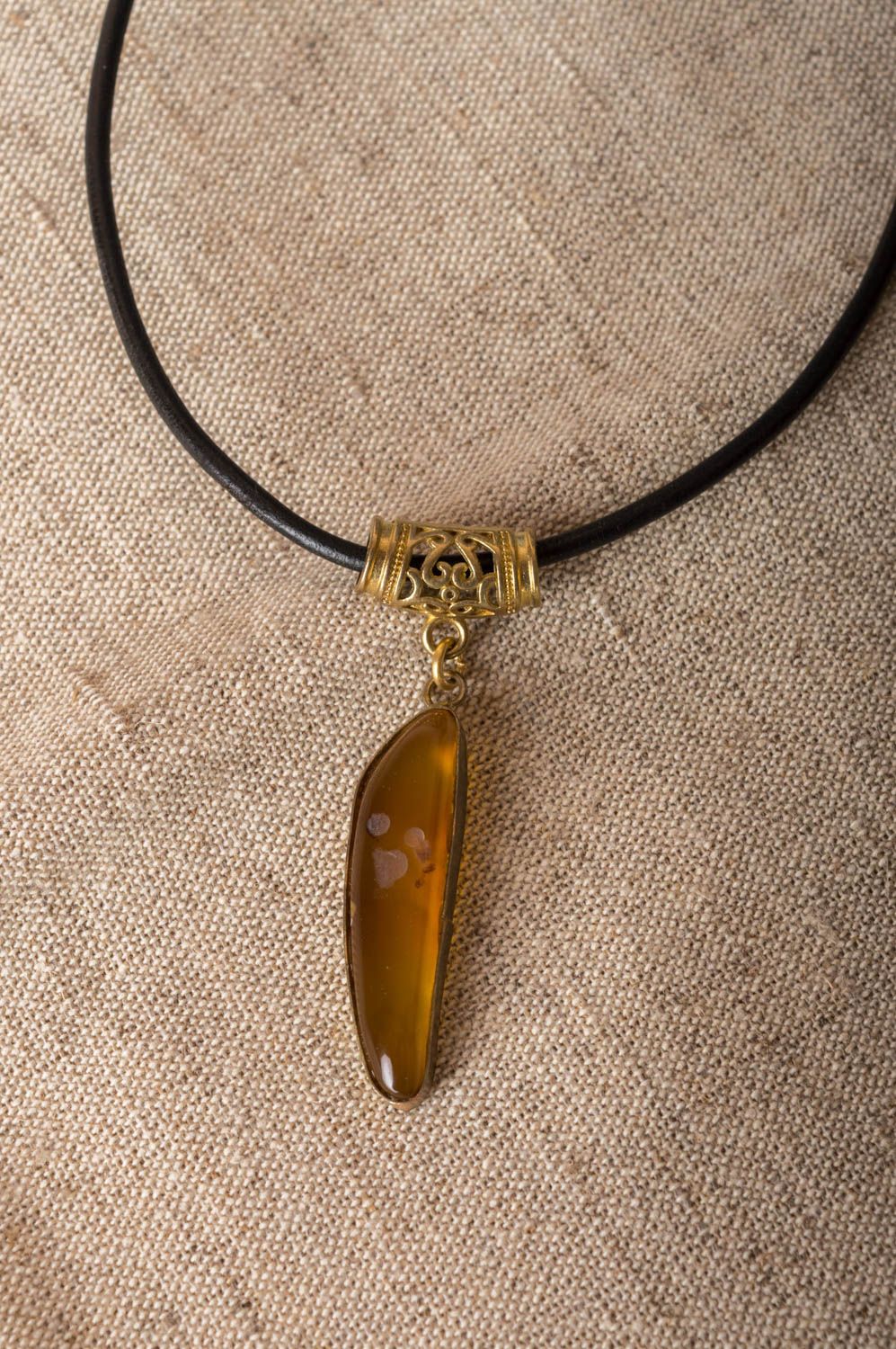 Beautiful stylish handmade neck pendant with natural stone on leather cord photo 1