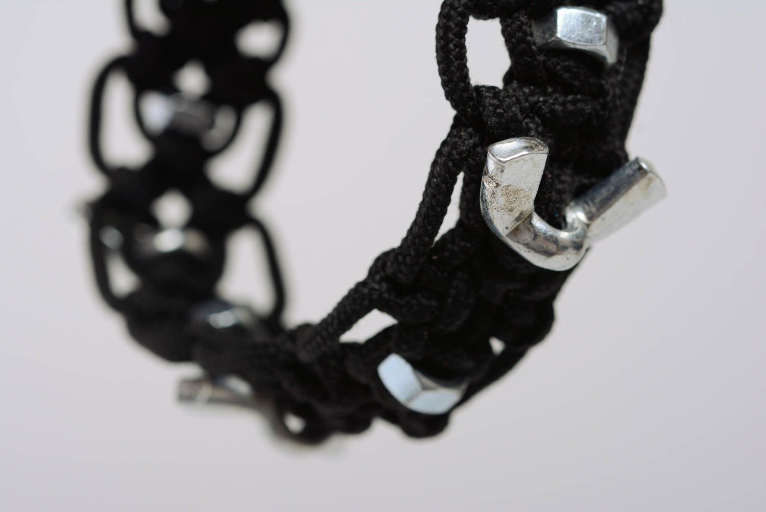 Handmade black macrame woven cord bracelet with stainless steel nuts photo 4