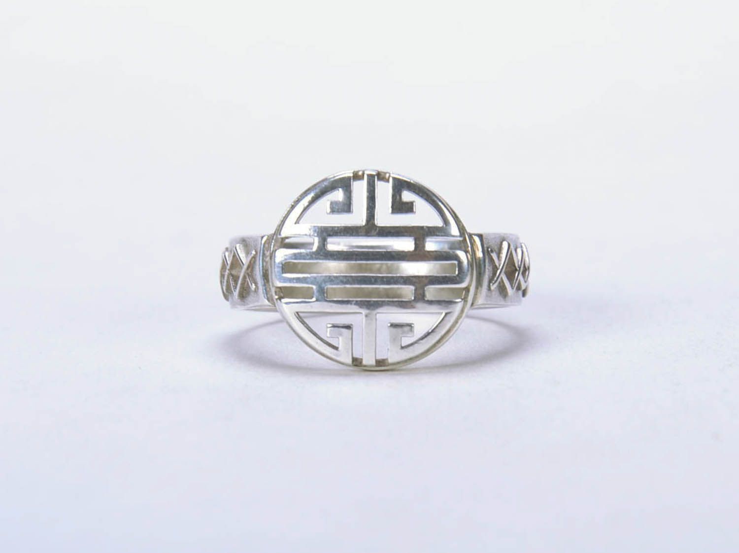 Silver ring with ethnic pattern photo 3