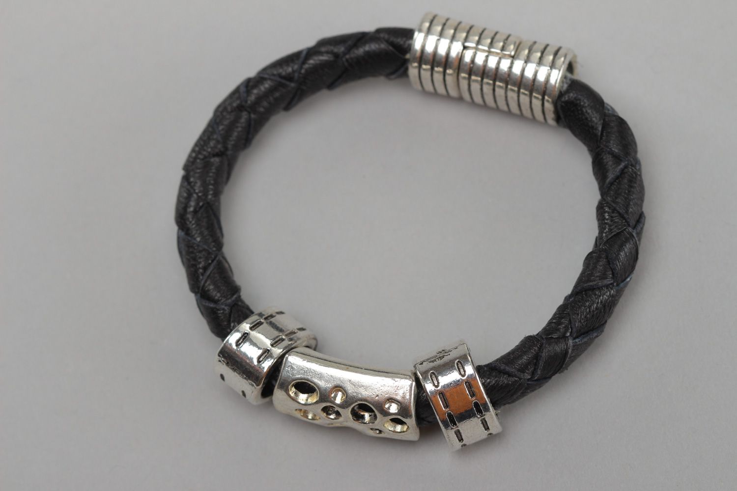 Unisex black and silvery handmade genuine leather bracelet with metal charm photo 2