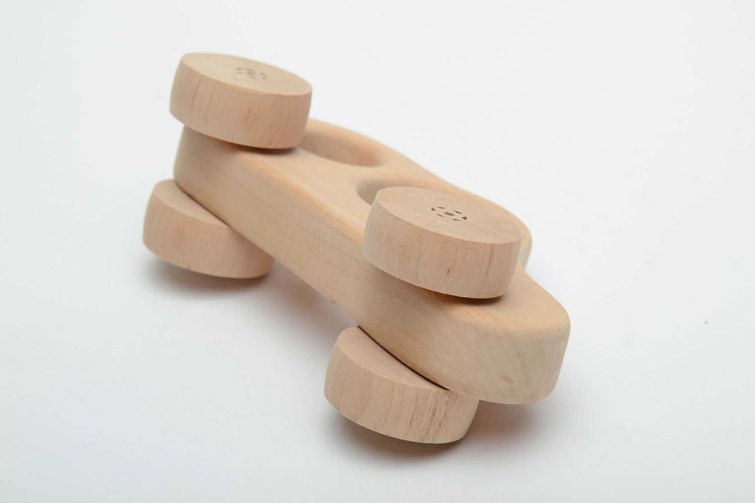 Wooden wheeled toy car photo 4