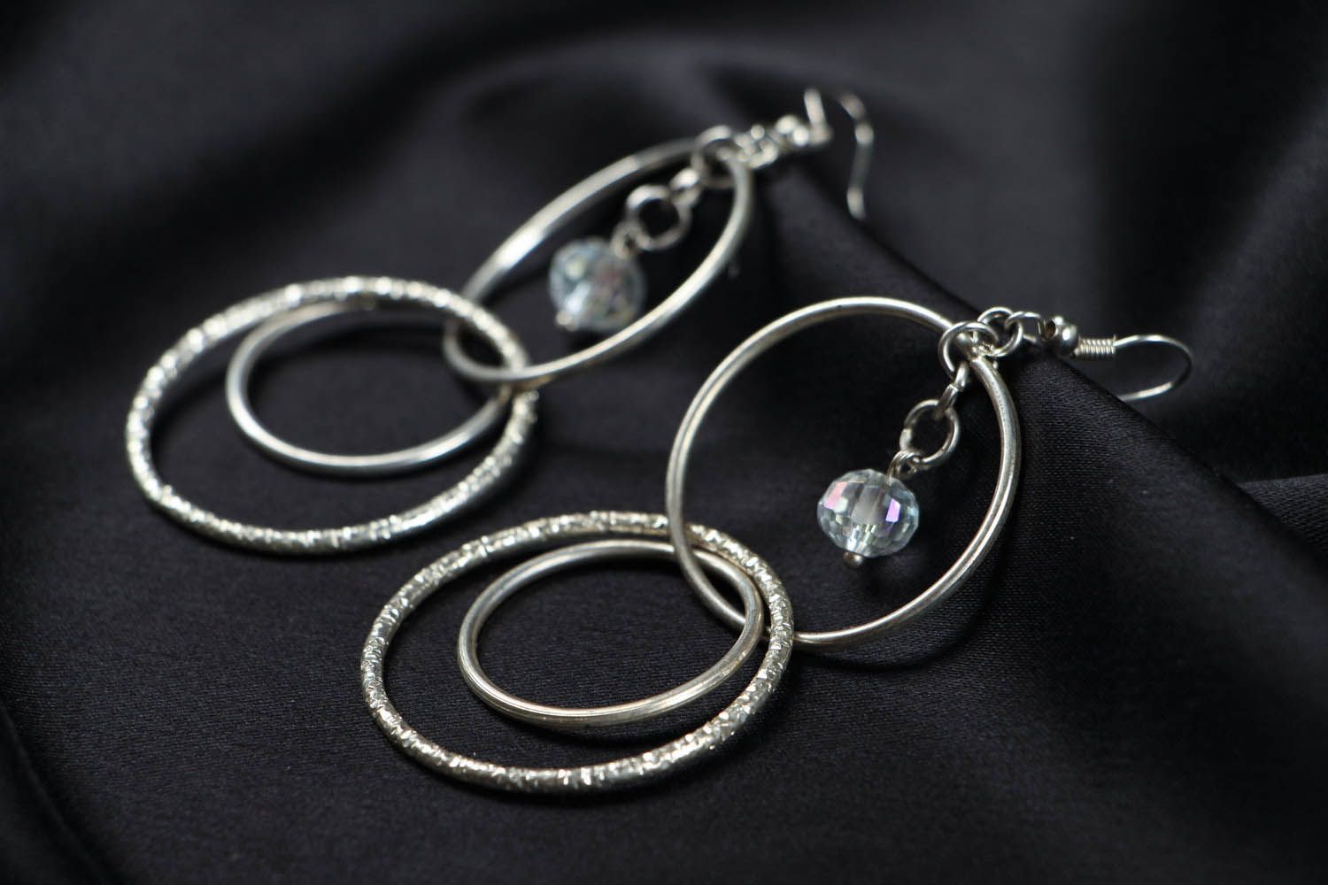 Metal earrings with crystal photo 2