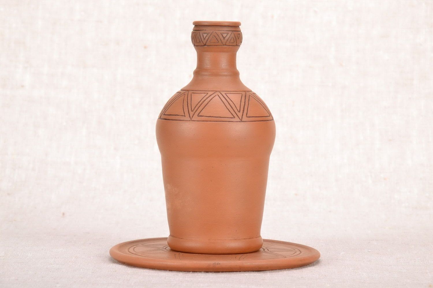 Garrafa de cerâmica com suporte foto 2