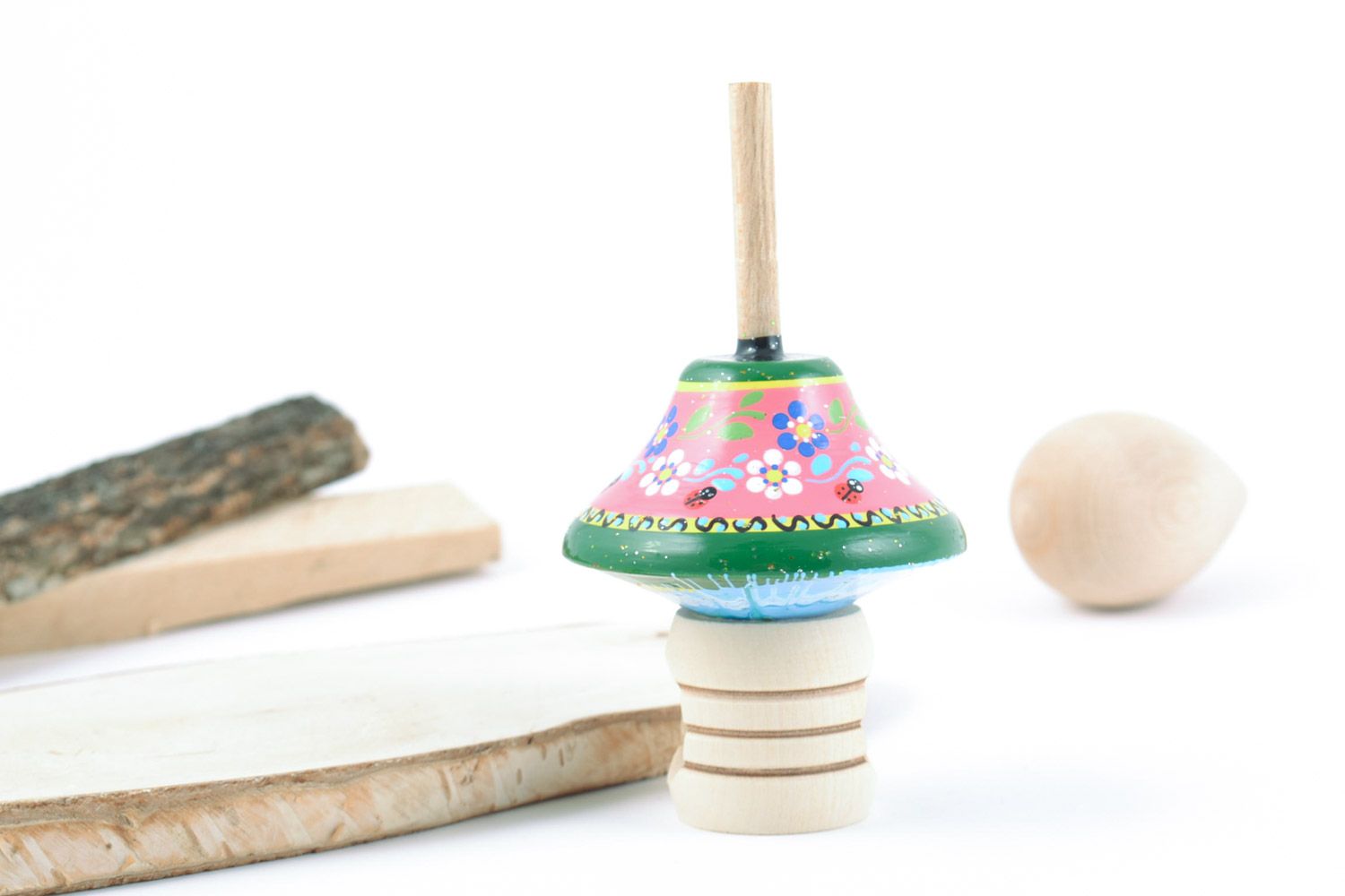 Petite toupie en bois peinte multicolore originale jouet d'éveil fait main photo 1