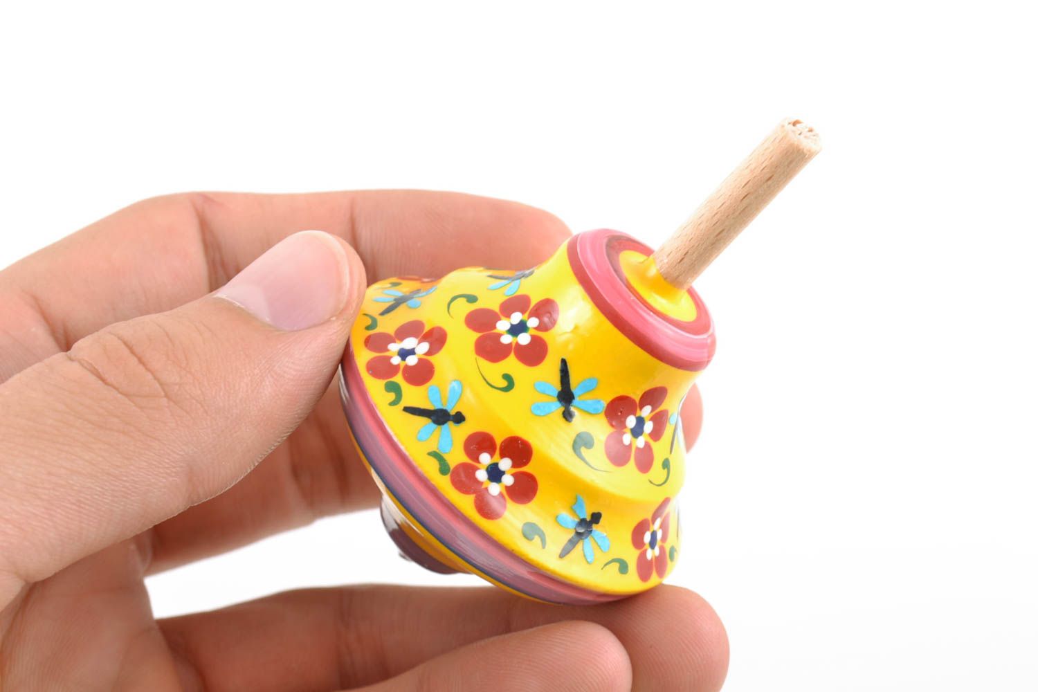 Small painted yellow handmade wooden toy spinning top for children photo 2