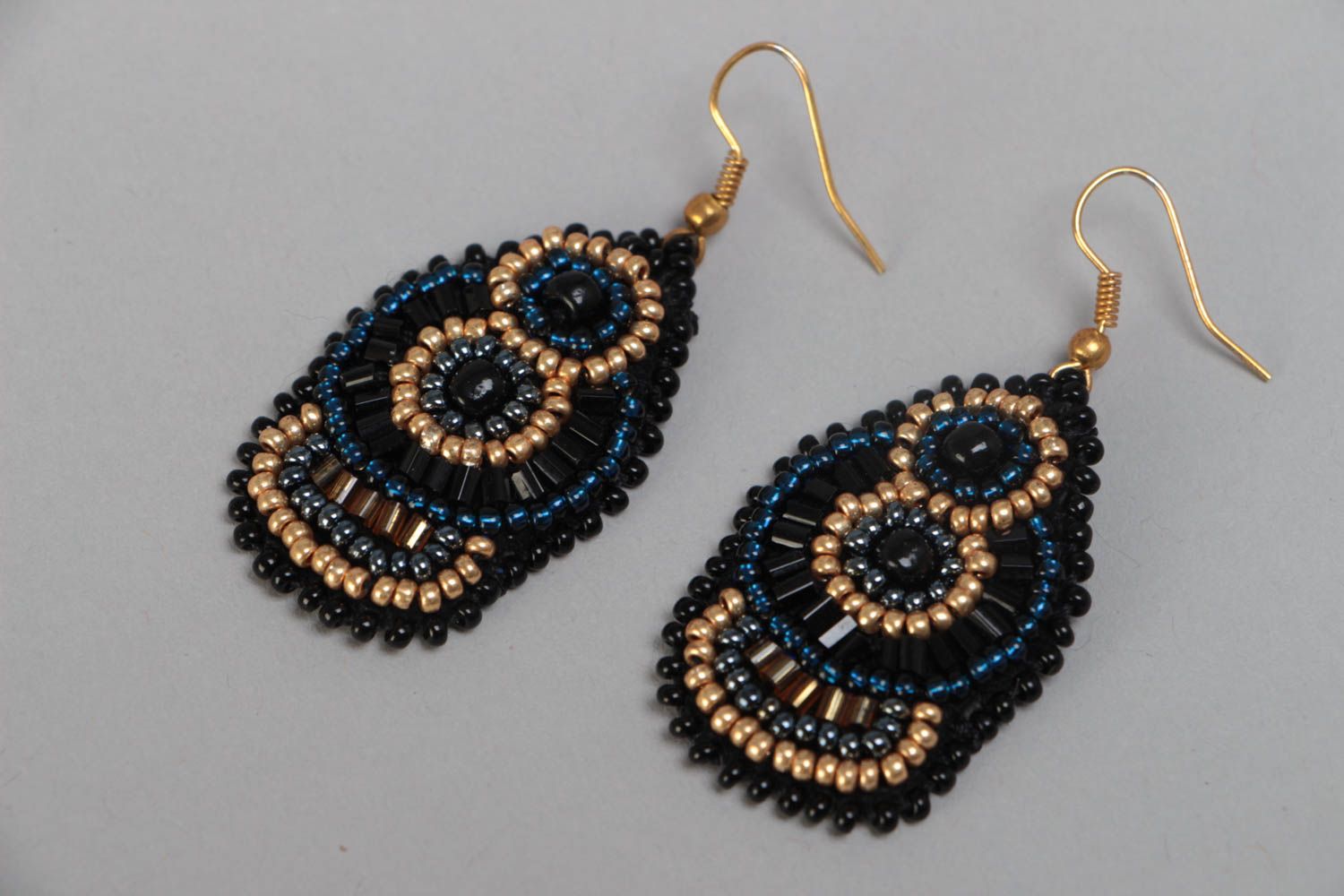 Large handmade designer woven beaded earrings on leather basis photo 2